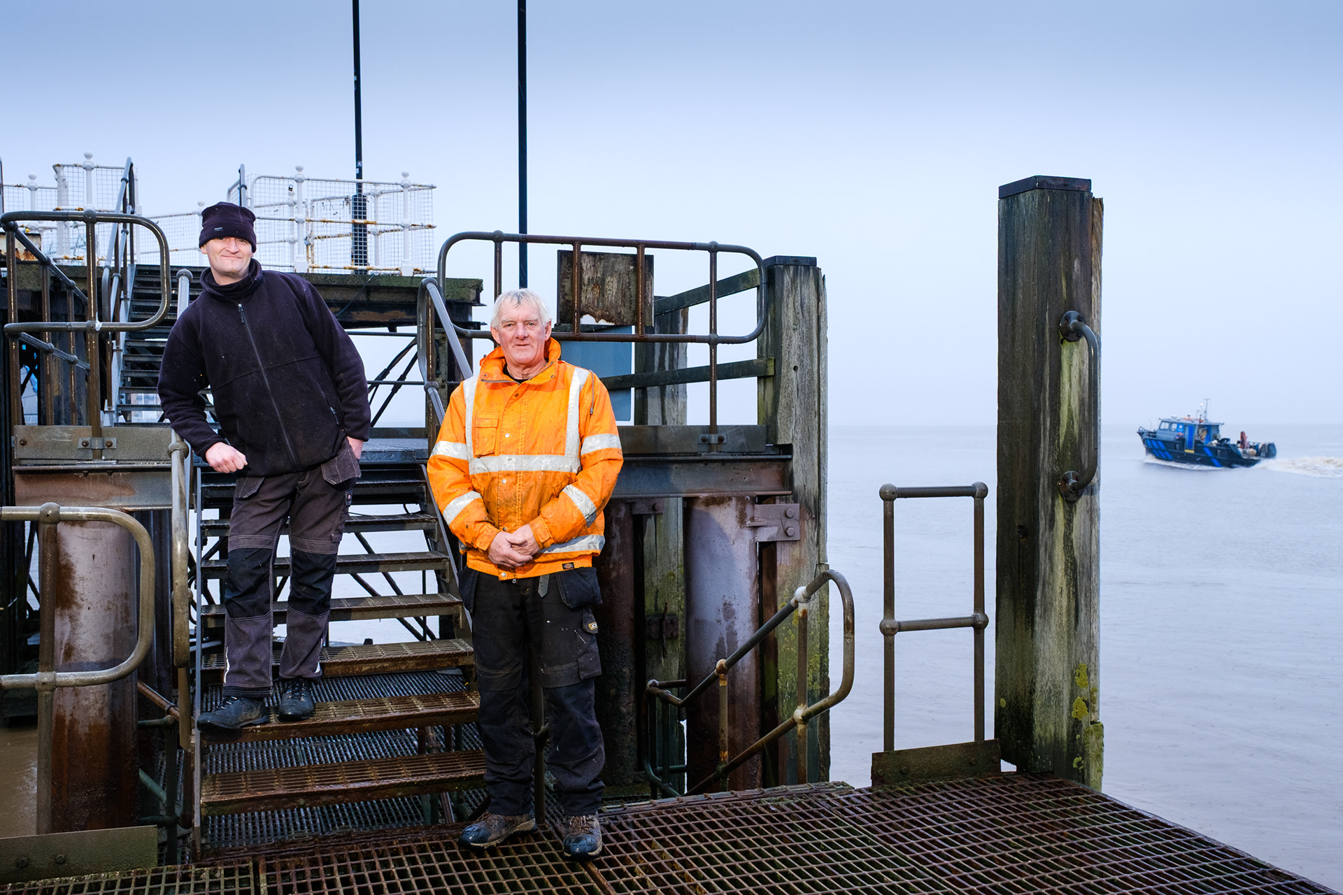Ref: nh_20191220_0059. Victoria Pier (Corporation Pier), Hull. Farther and Son shipwrights, Les and Gareth Robinson. Part of their job is maintaining the pier, plus the city’s flood drains; they’ve rebuilt much of Victoria Pier. Kingston Upon Hull, East Yorkshire, United Kingdom, 20 December, 2019.