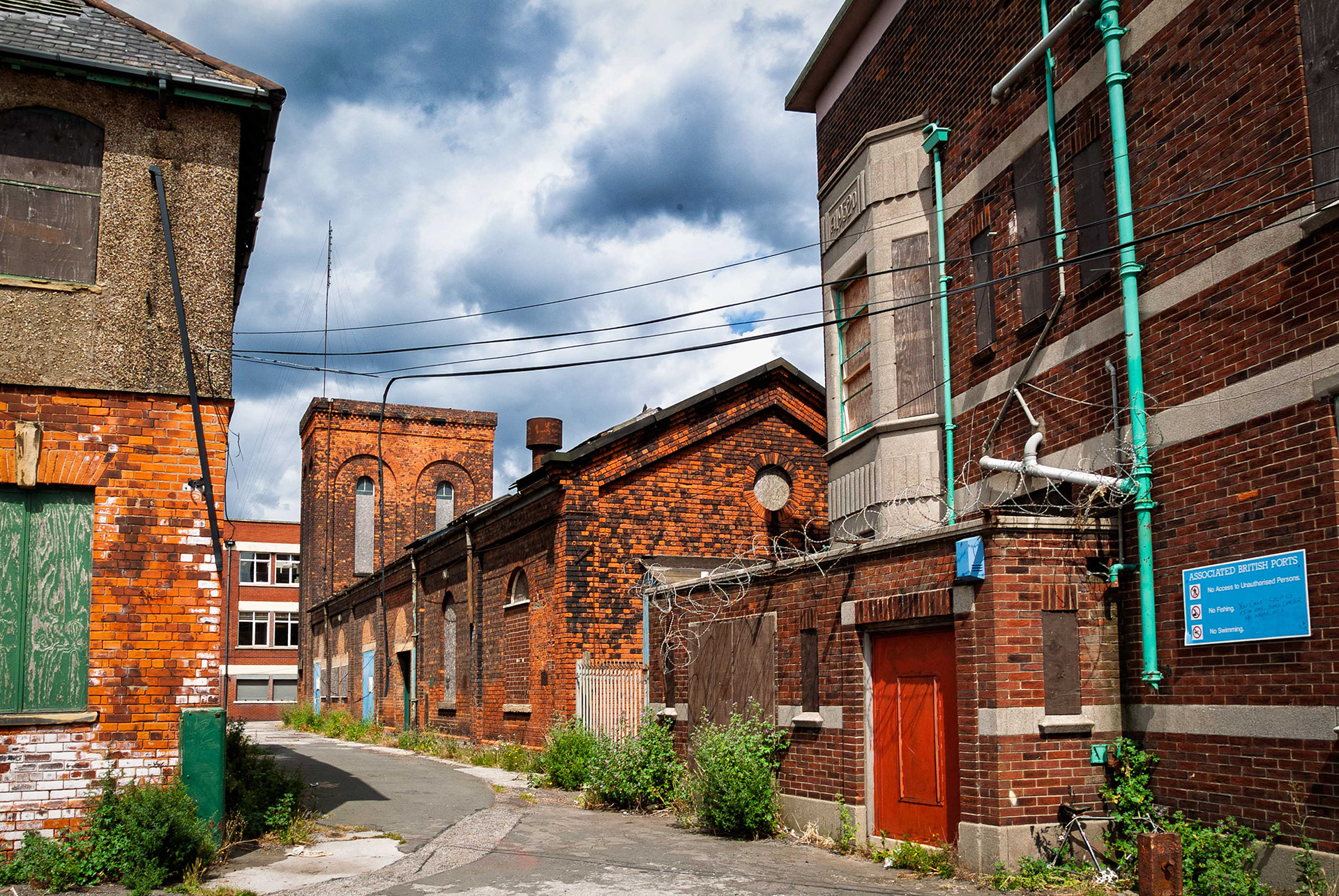 Ref: St Andrews Dock 20050726_4659_edit. St Andrews Dock, Kingston Upon Hull, East Yorkshire, United Kingdom, 26 July, 2005. Pictured: The Derelict Tanning Co Ltd, dock and buildings of the former home to Hull’s Fishing Industry, St Andrews Dock. The dock closed to shipping in 1975, and the remaining dockside buildings are now gone or in a state of decay.