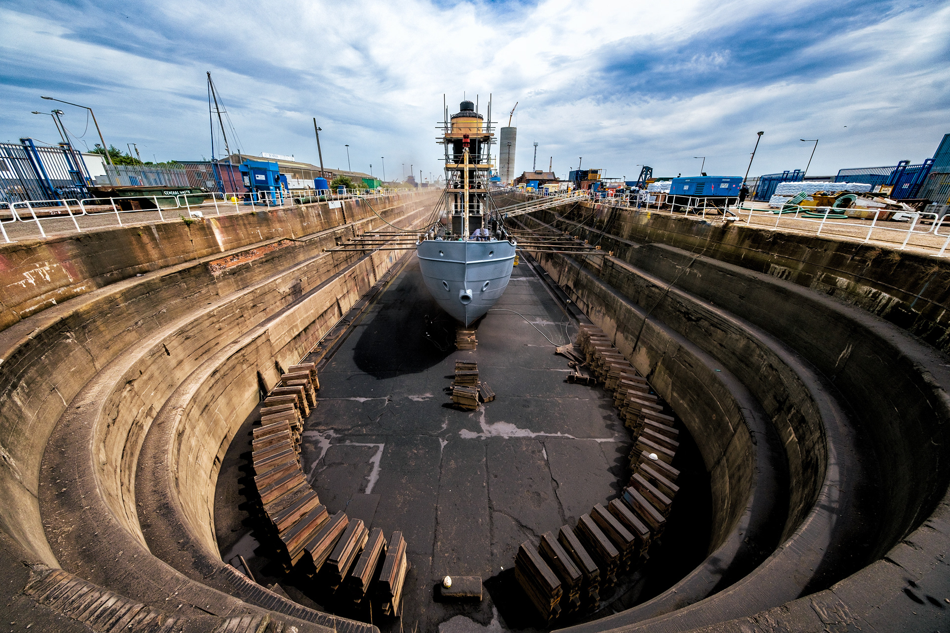 William Wright Dock, Kingston Upon Hull, East Yorkshire, United Kingdom, 17 June, 2022. Pictured: Arctic Corsair and the Spurn Lightship in dry dock together. The historic vessels are undergoing shot-blasting and painting. Hull Maritime Project.