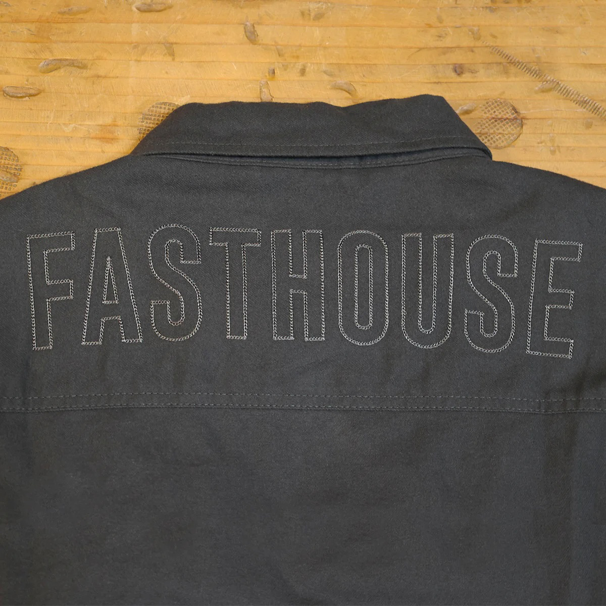 Fine single needle stitch on back