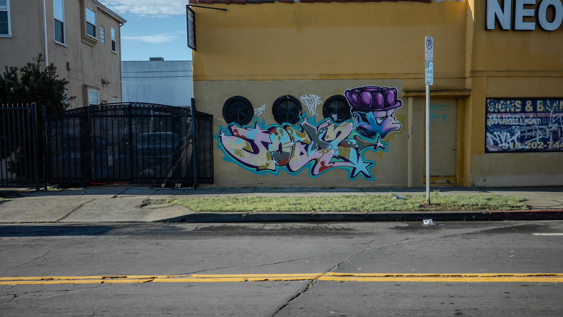 Graffiti On Yellow Building
