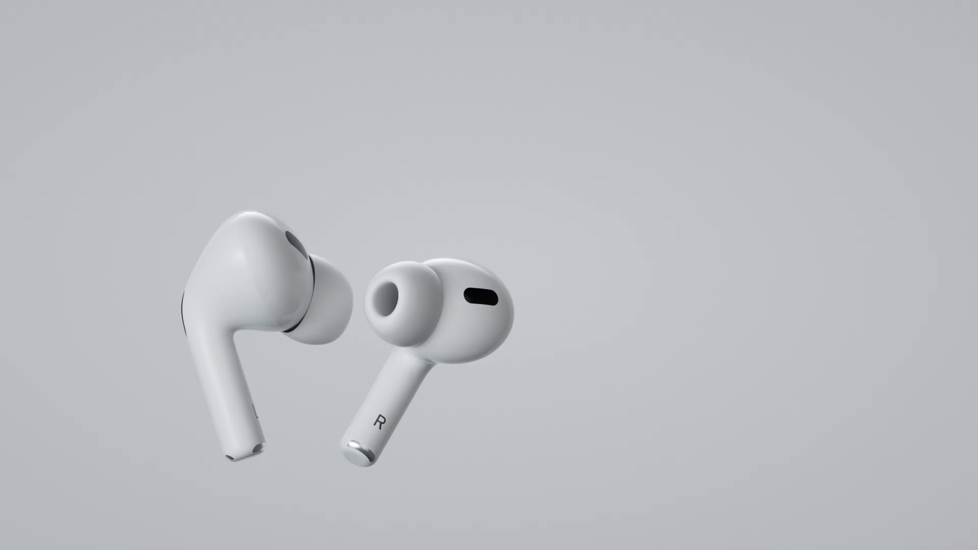 Pair of white in-ear wireless earbuds with a sleek design, floating against a light grey background.