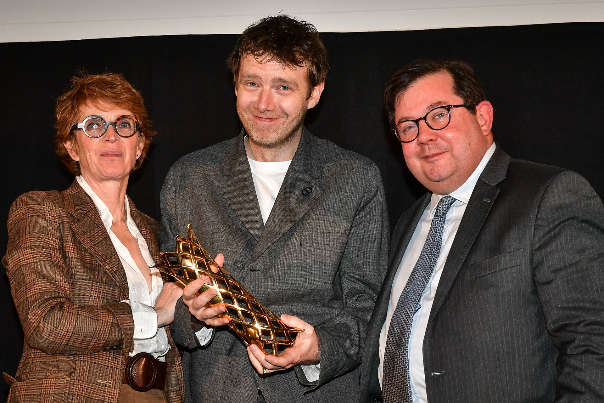 French actor Antoine Reinartz holds the Daniel Toscan du Plantier Producer's Prize 2024 representing its winner Marie-Ange Luciani during the Producer's Dinner - Cesar 2024 at the InterContinental Hotel in Paris on February 12, 2024. Firas Abdullah / Abaca Press