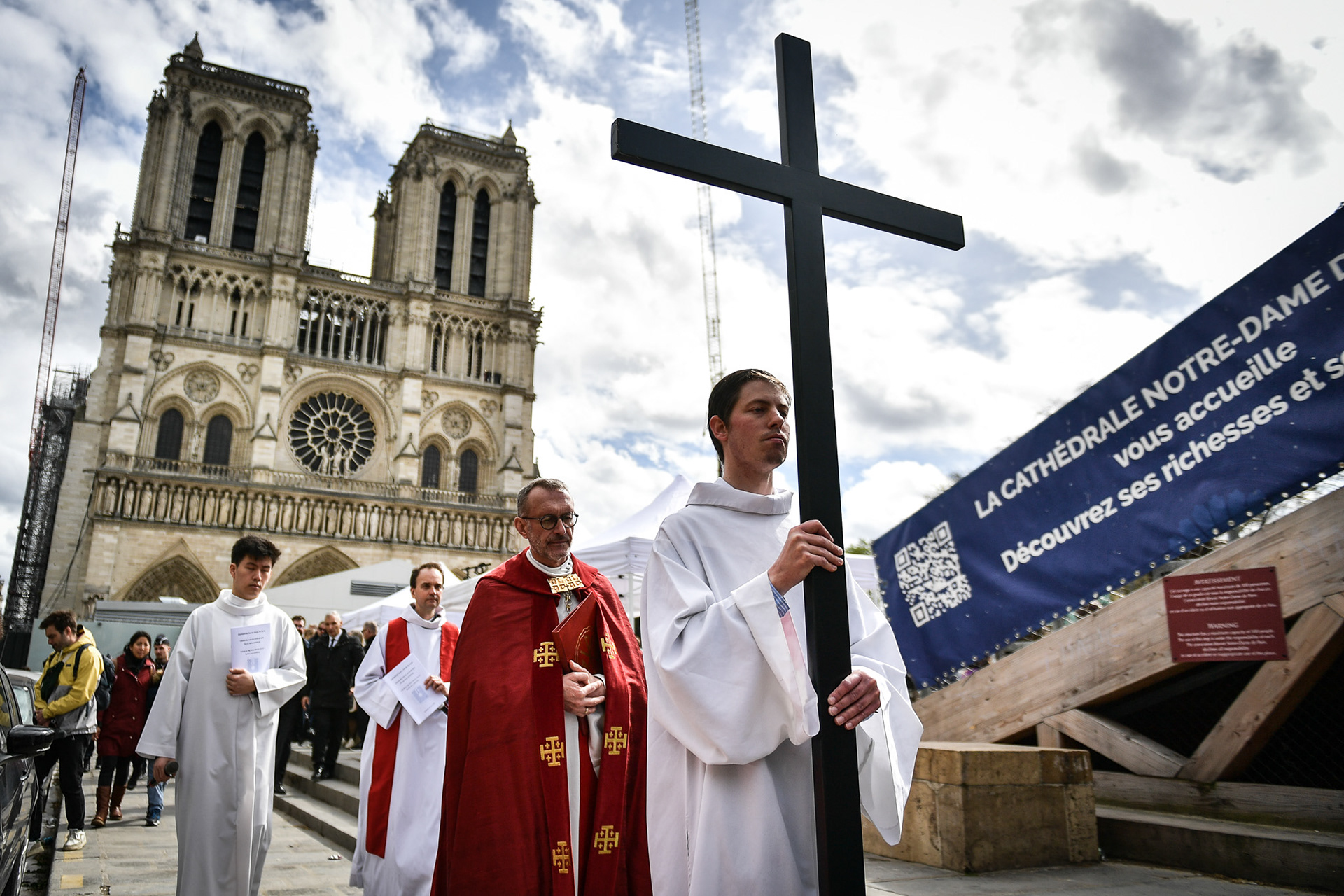 Nuns and worshippers attend the Stations of the Cross procession on Good Friday in front of Notre Dame de Paris Cathedral and Sacre Coeur Basilica in Paris on March 29, 2024. Firas Abdullah / Abaca Press