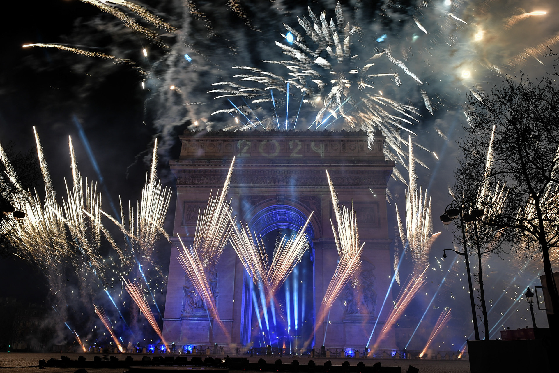 Fireworks of the New Year's celebration at the Arc de Triomphe at the top of the Champs-Elysees in Paris, on January 1, 2024. Firas Abdullah / Abaca Press