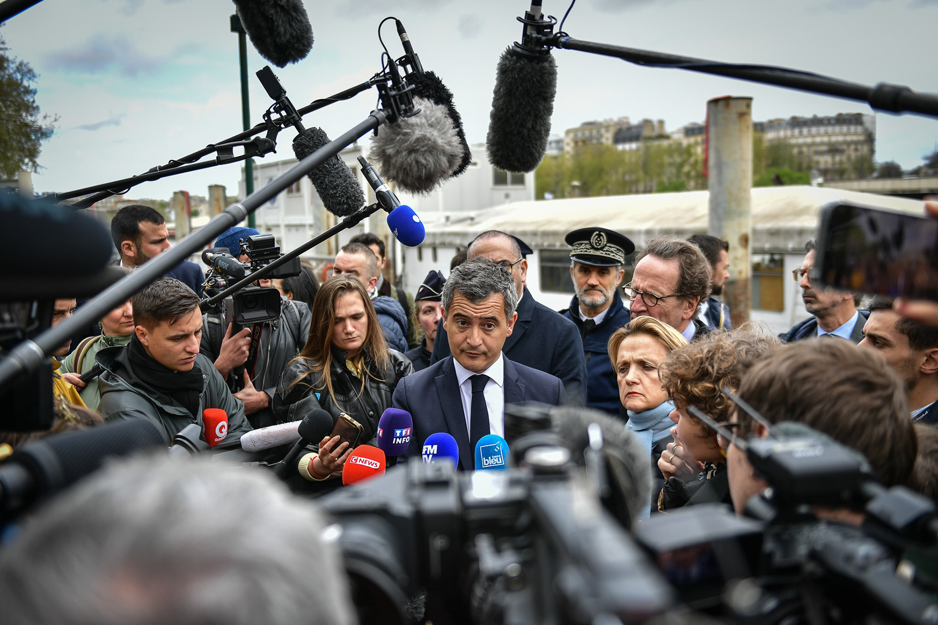 French Interior and Overseas Minister Gerald Darmanin meets with members of the River Brigade on the security for the opening ceremony of the Paris Olympic Games in Paris on April 9, 2024. Firas Abdullah / Abaca Press