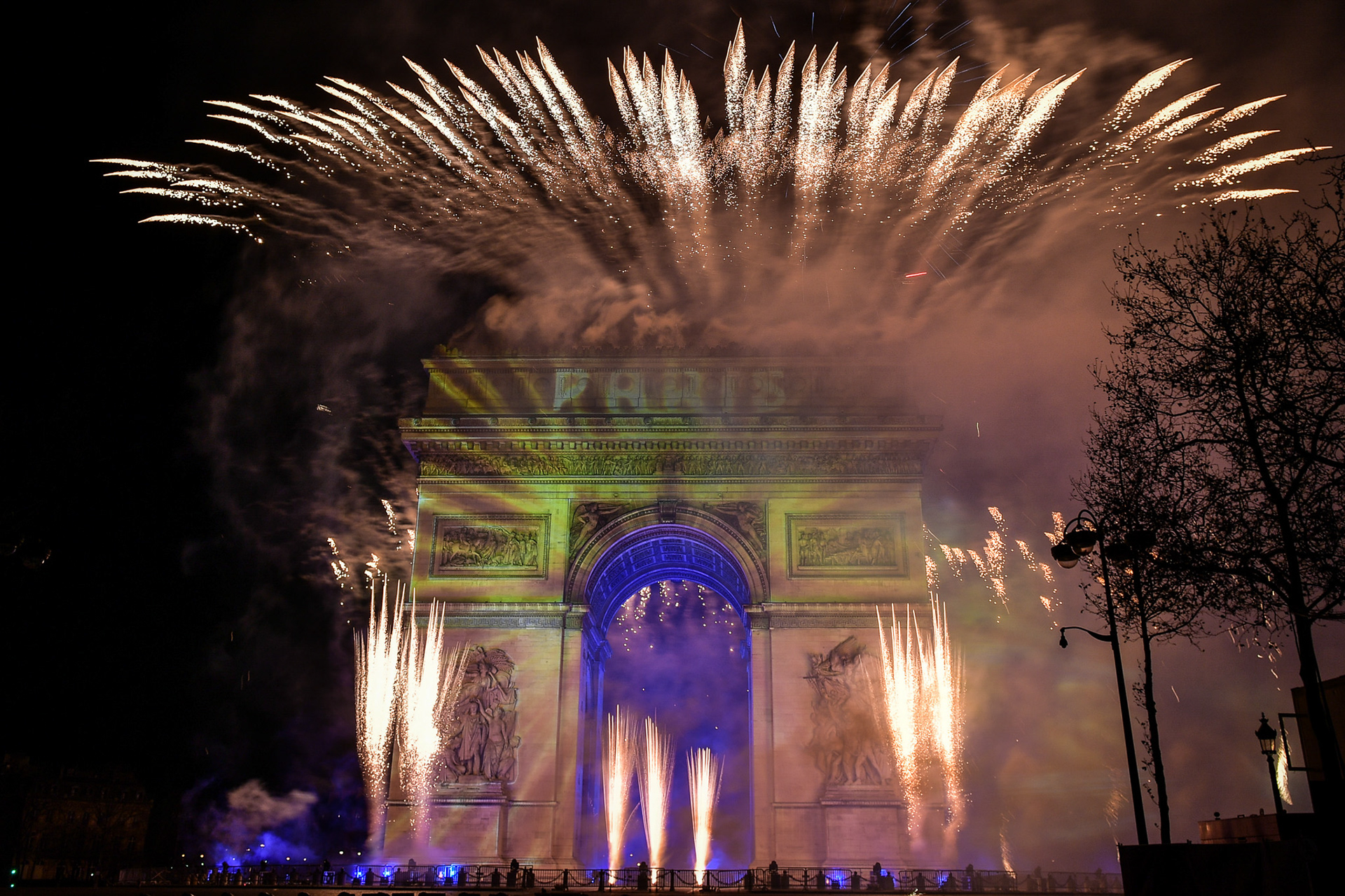 Fireworks of the New Year's celebration at the Arc de Triomphe at the top of the Champs-Elysees in Paris, on January 1, 2024. Firas Abdullah / Abaca Press