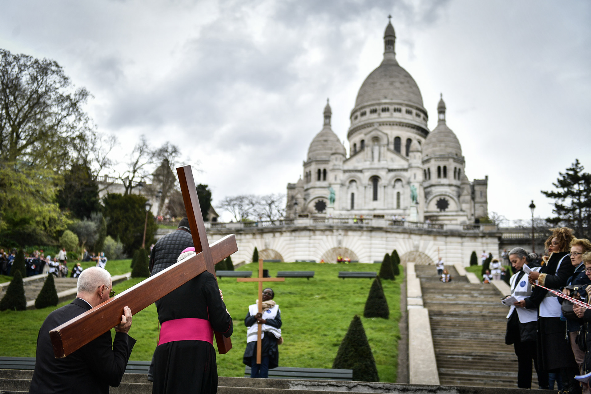 Nuns and worshippers attend the Stations of the Cross procession on Good Friday in front of Notre Dame de Paris Cathedral and Sacre Coeur Basilica in Paris on March 29, 2024. Firas Abdullah / Abaca Press