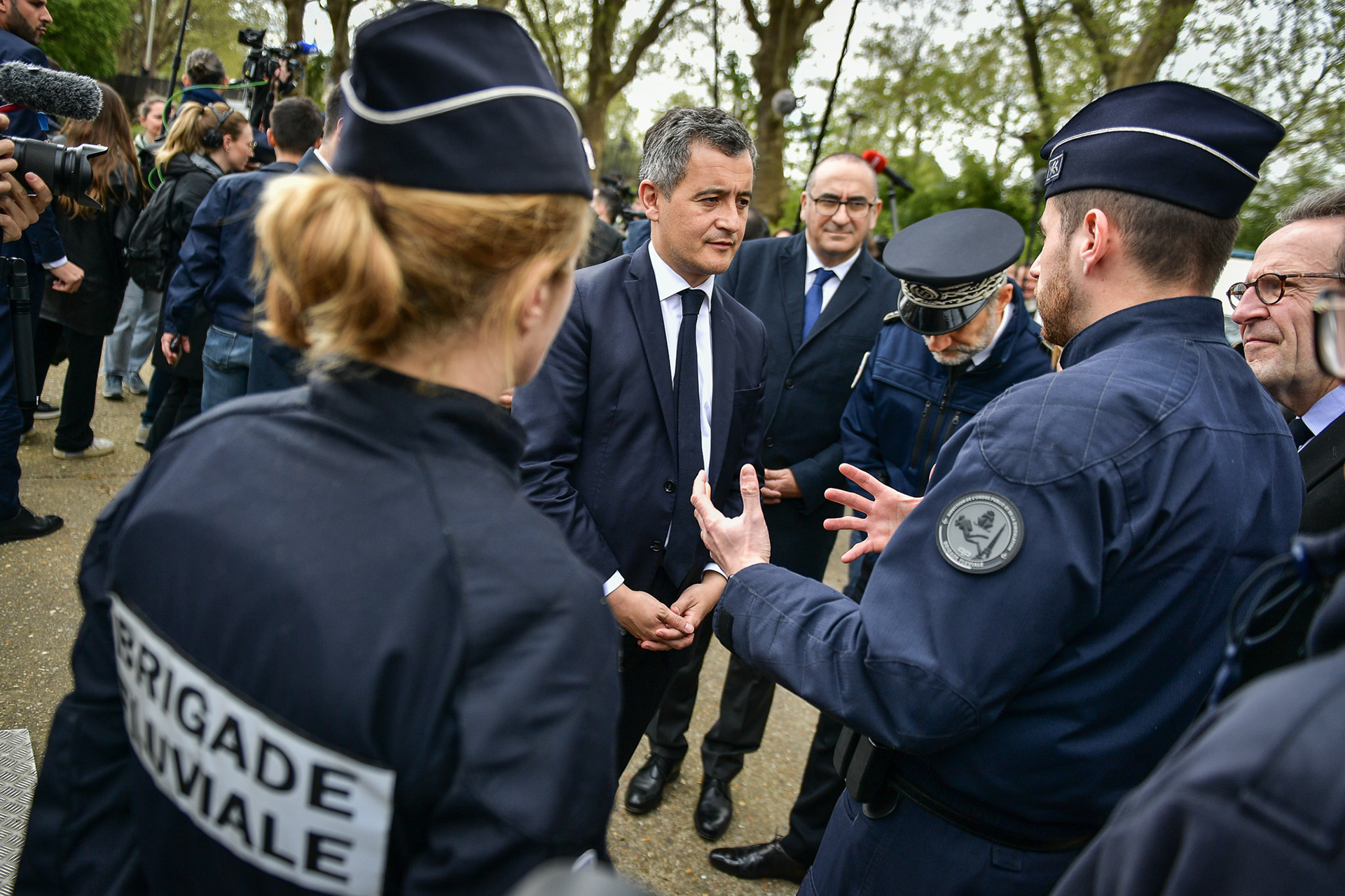 French Interior and Overseas Minister Gerald Darmanin meets with members of the River Brigade on the security for the opening ceremony of the Paris Olympic Games in Paris on April 9, 2024. Firas Abdullah / Abaca Press