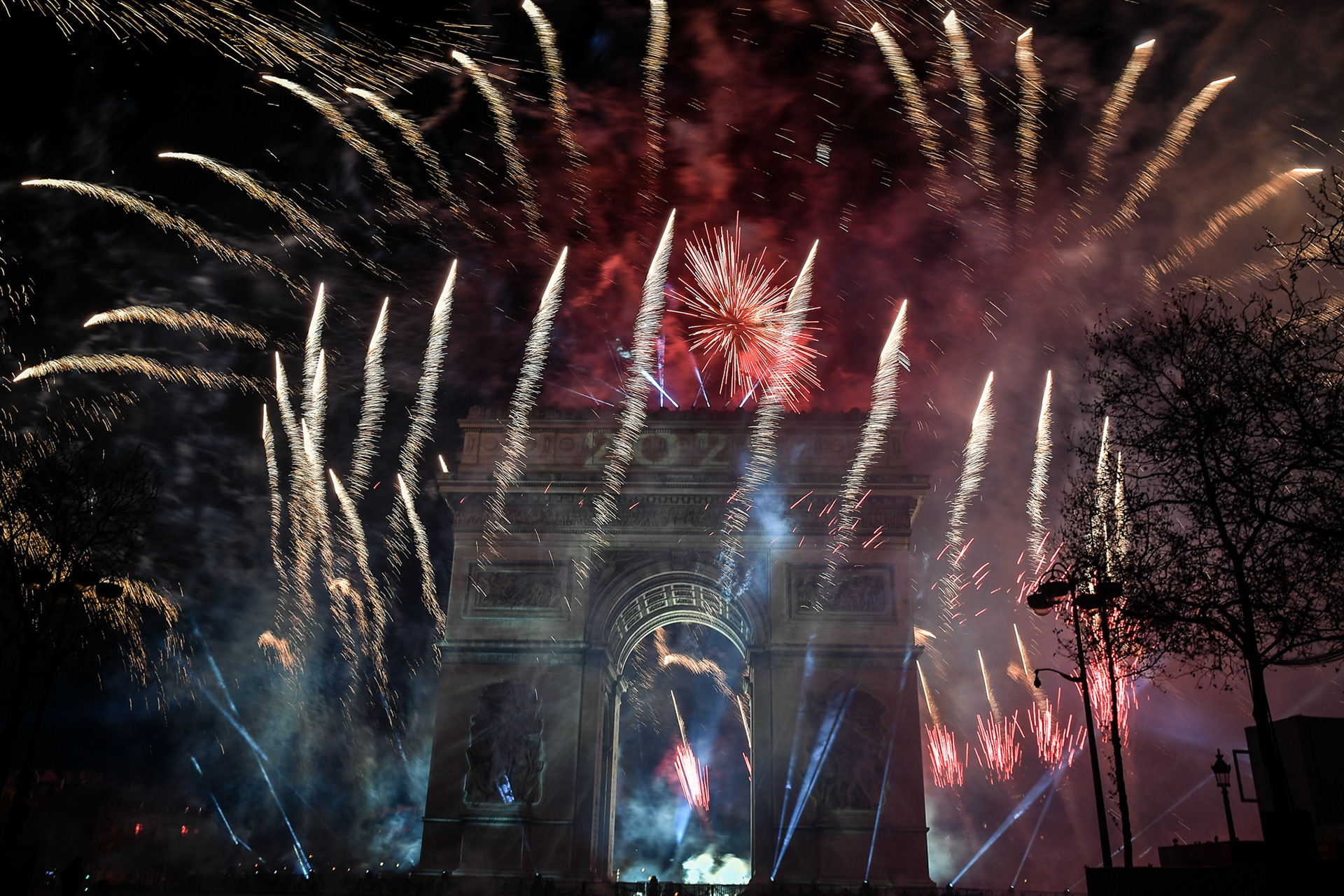 Fireworks of the New Year's celebration at the Arc de Triomphe at the top of the Champs-Elysees in Paris, on January 1, 2024. Firas Abdullah / Abaca Press