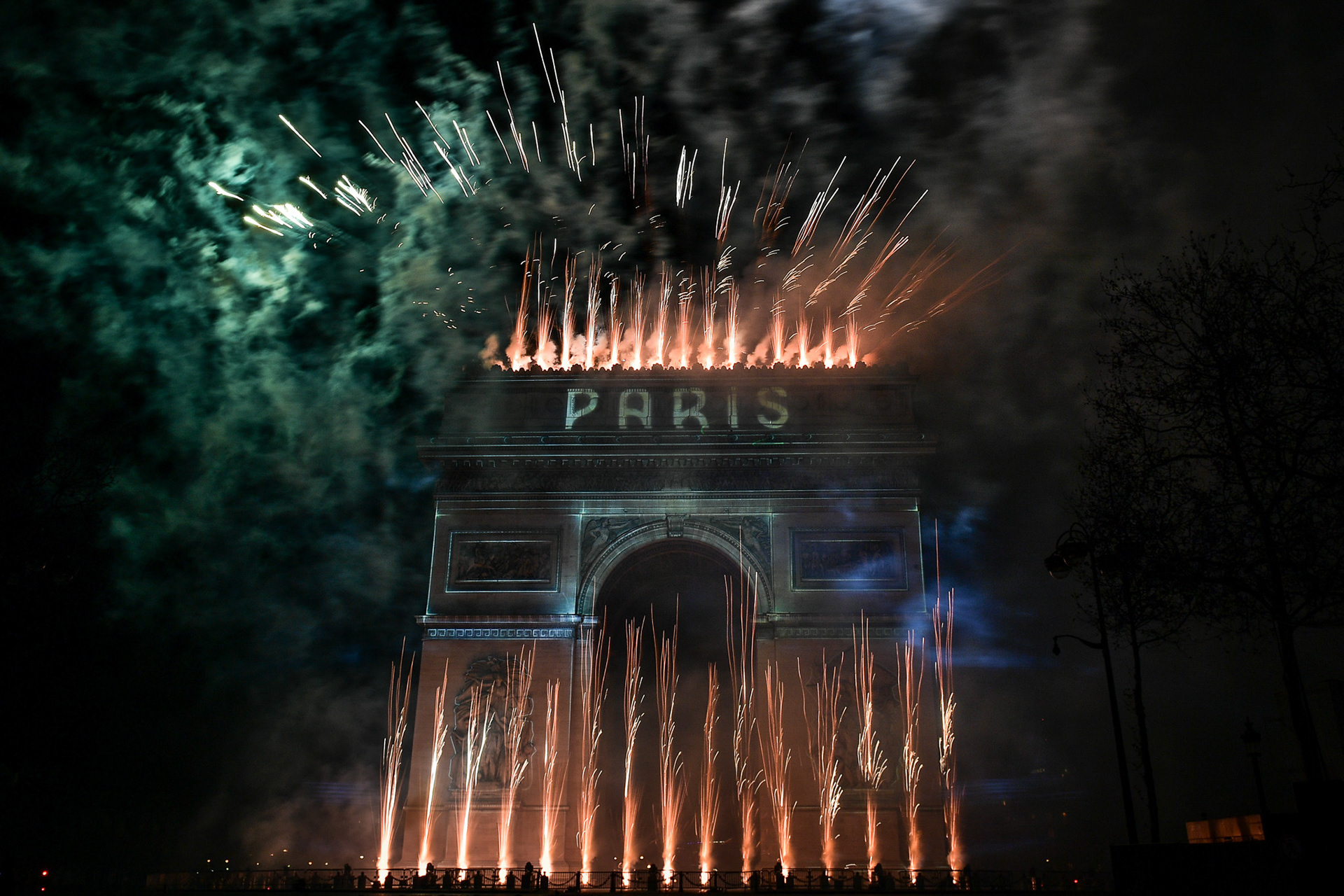 Fireworks of the New Year's celebration at the Arc de Triomphe at the top of the Champs-Elysees in Paris, on January 1, 2024. Firas Abdullah / Abaca Press