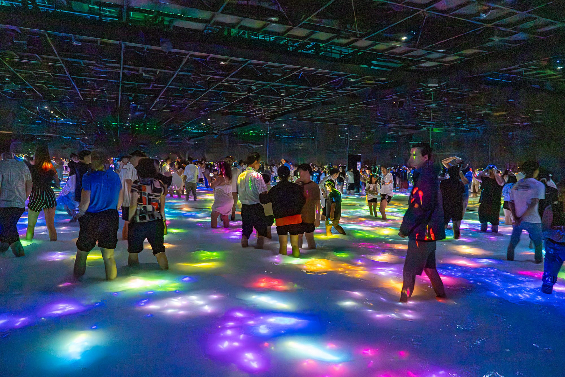 Tokyo Team Labs Planet. 5 out of 5 stars. highly recommended. Here everyone is walking in colorful water. 