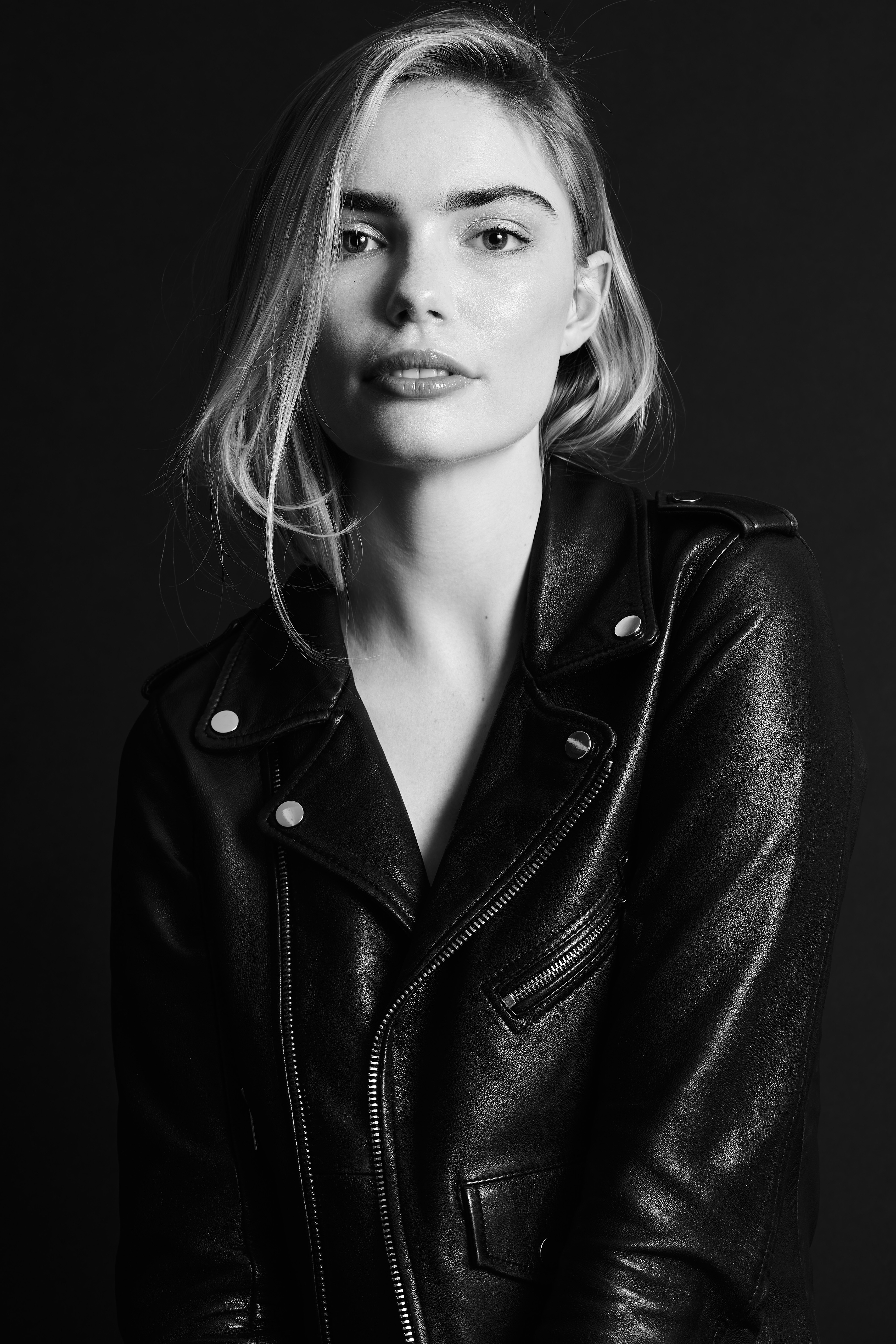 Miss Netherlands Finalist Marlies Smedinga in some black and white shots wearing a leather jacket.