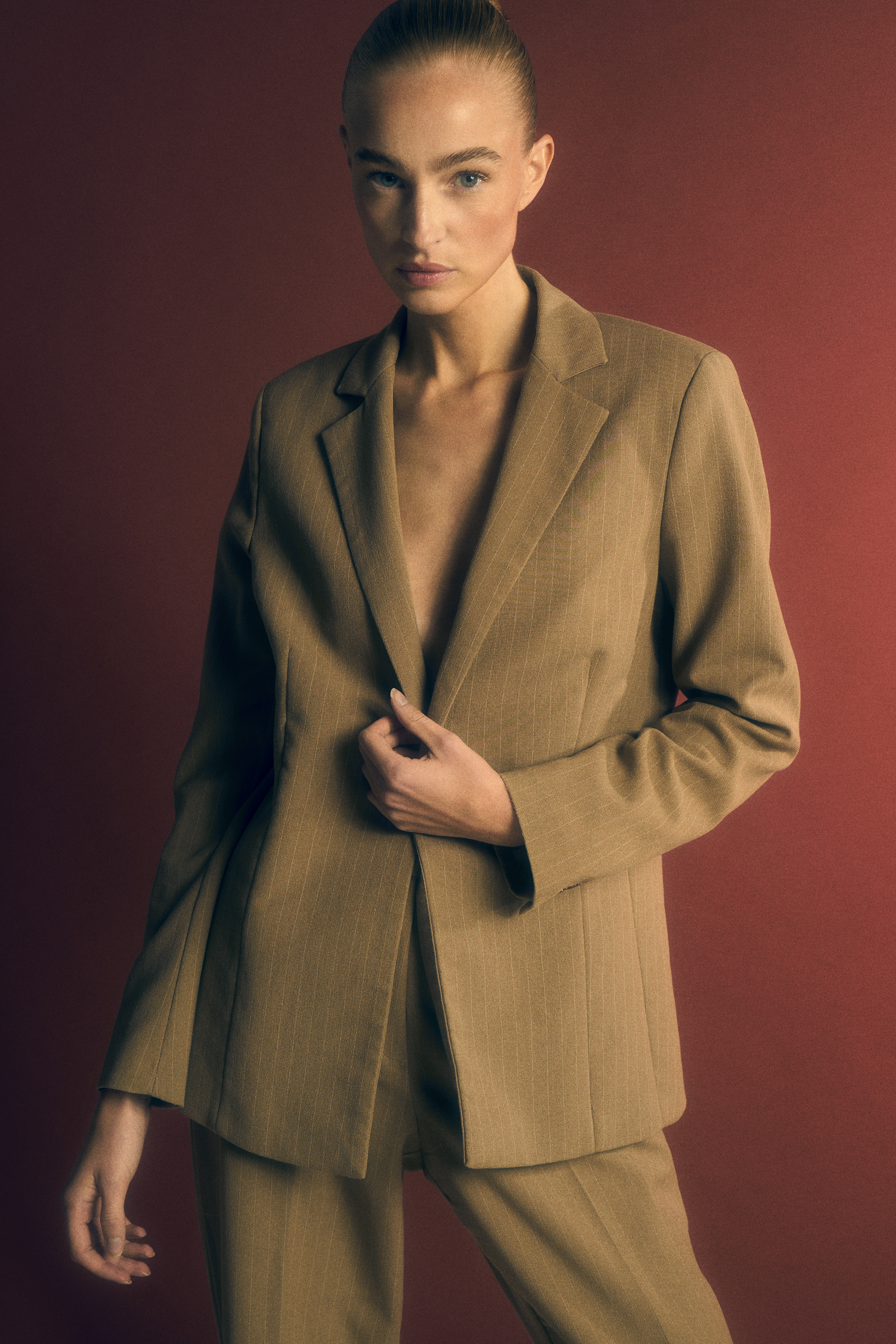 Iris P from Elite Models Amsterdam wearing a suit blazer in these fashion photos by JMstudio