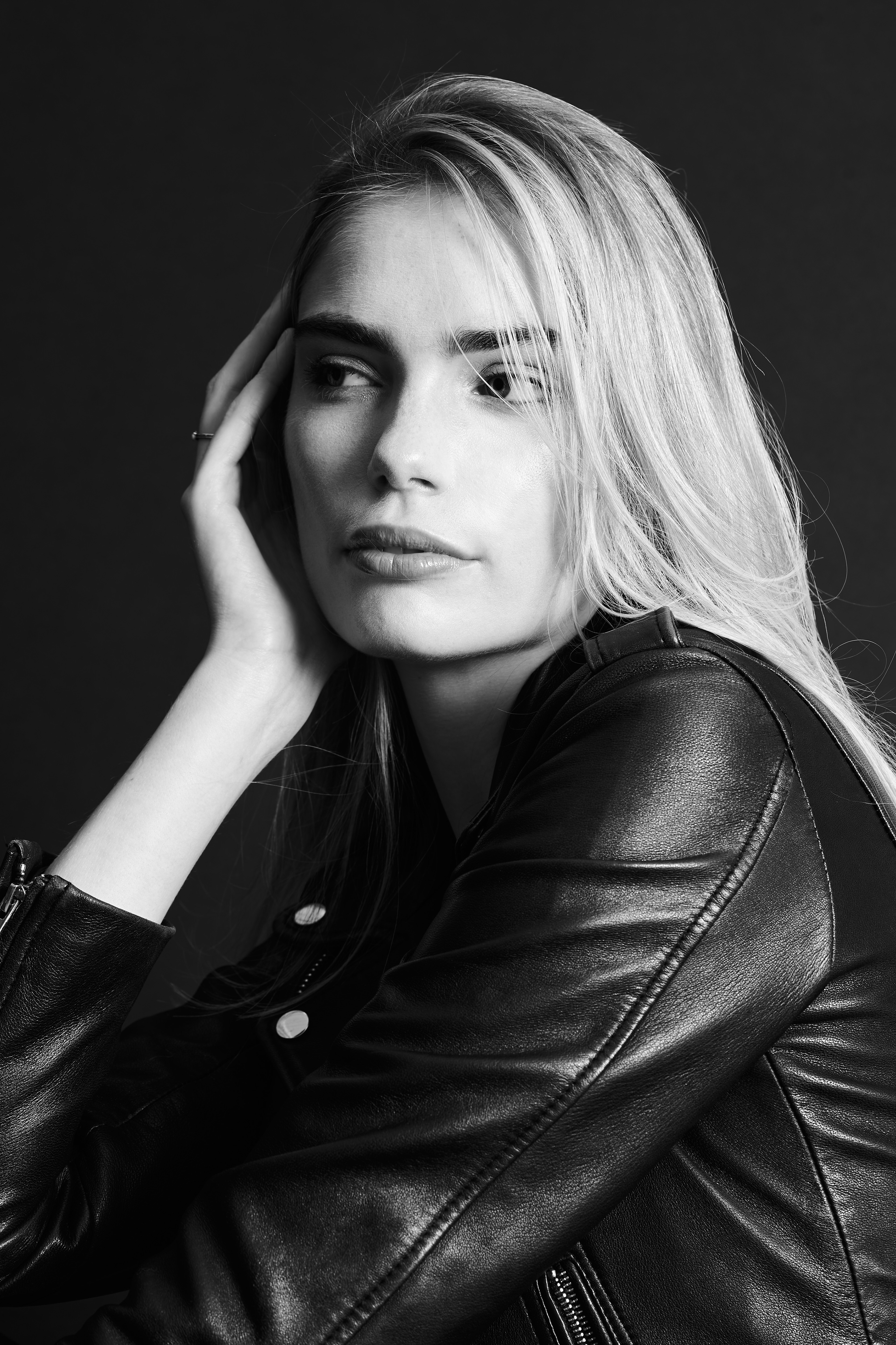 Miss Netherlands Finalist Marlies Smedinga in some black and white shots wearing a leather jacket.