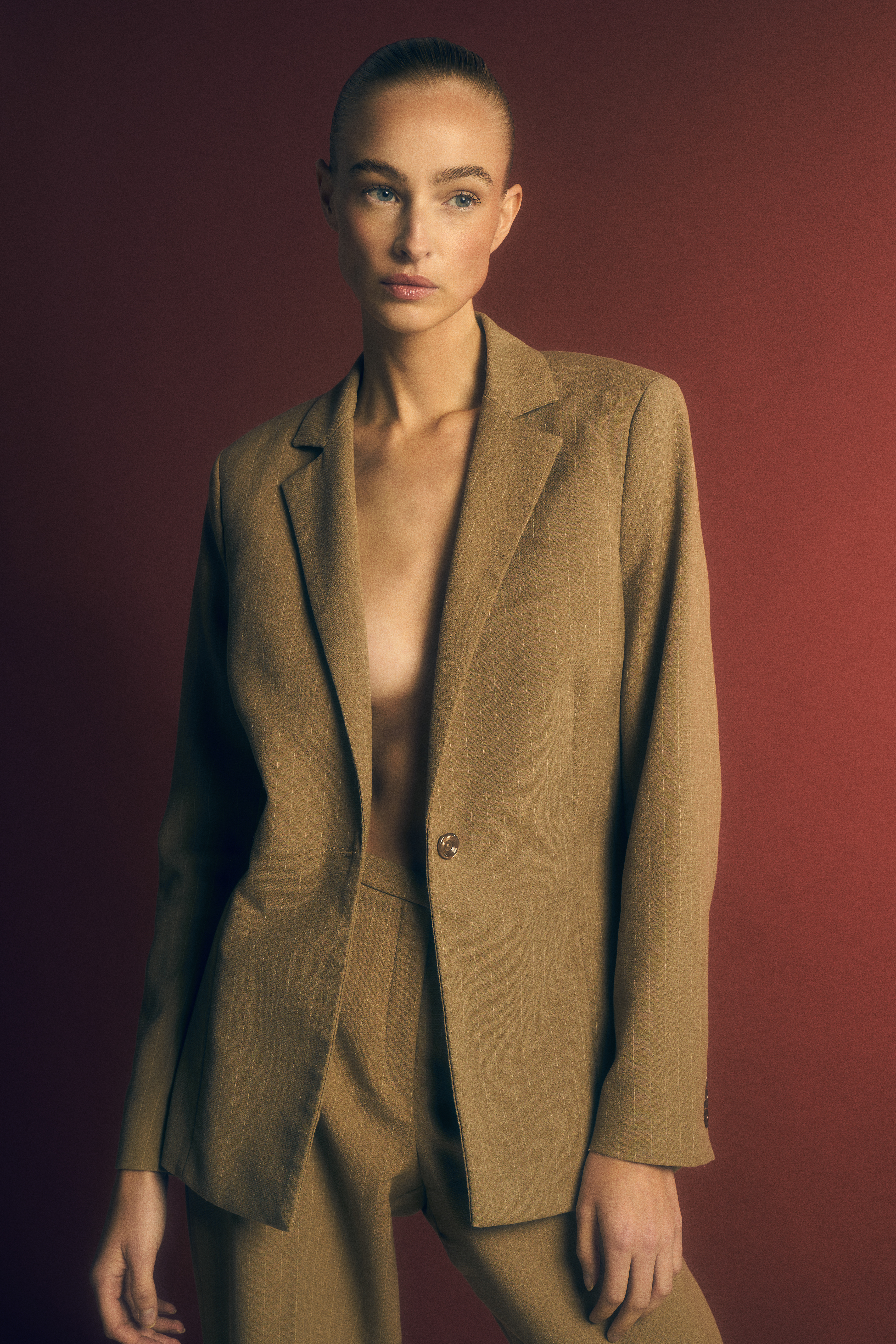 Iris P from Elite Models Amsterdam wearing a suit blazer in these fashion photos by JMstudio