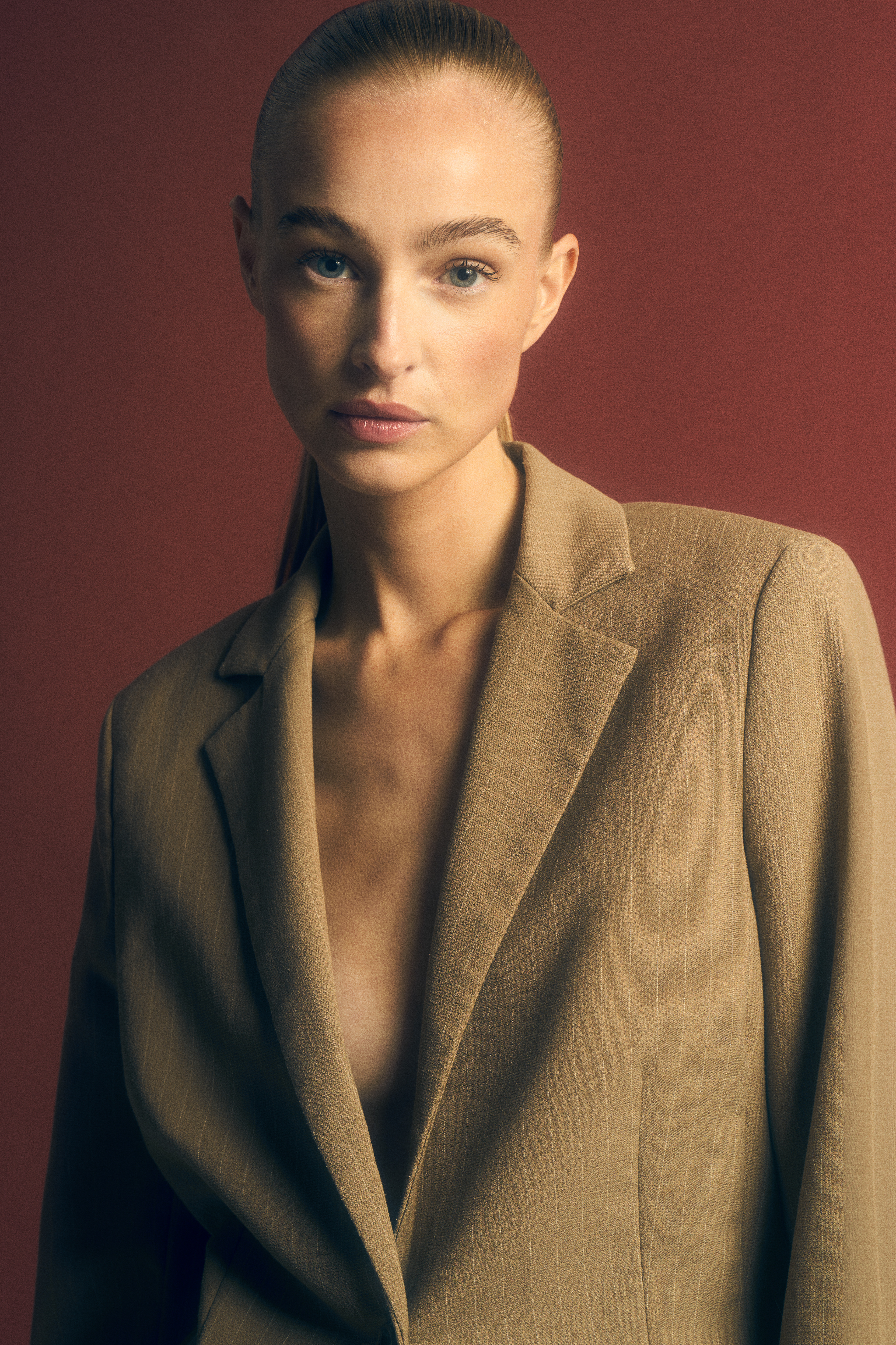 Iris P from Elite Models Amsterdam wearing a suit blazer in these fashion photos by JMstudio