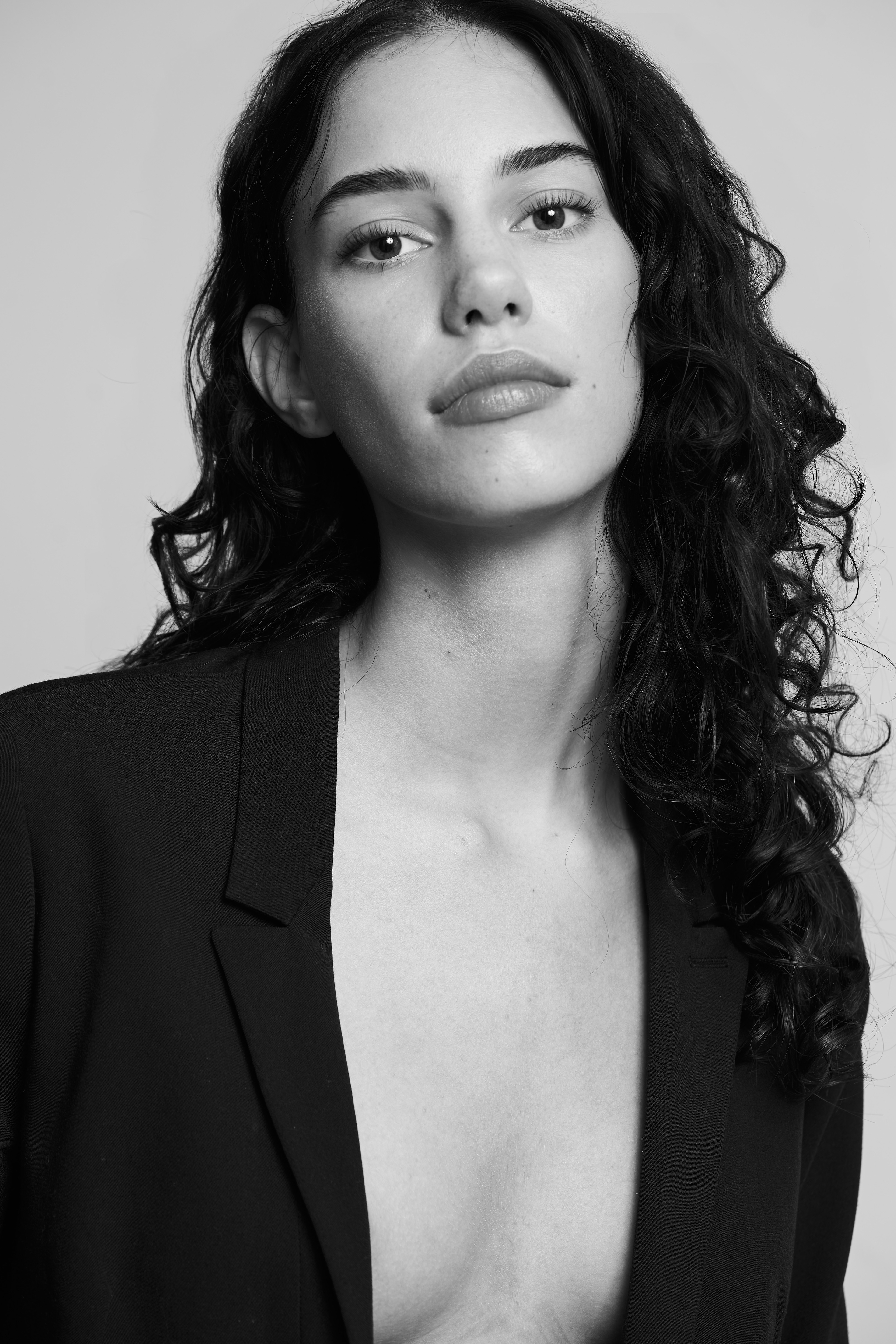 Robine Bitter from Elite Amsterdam wearing a black blazer. 