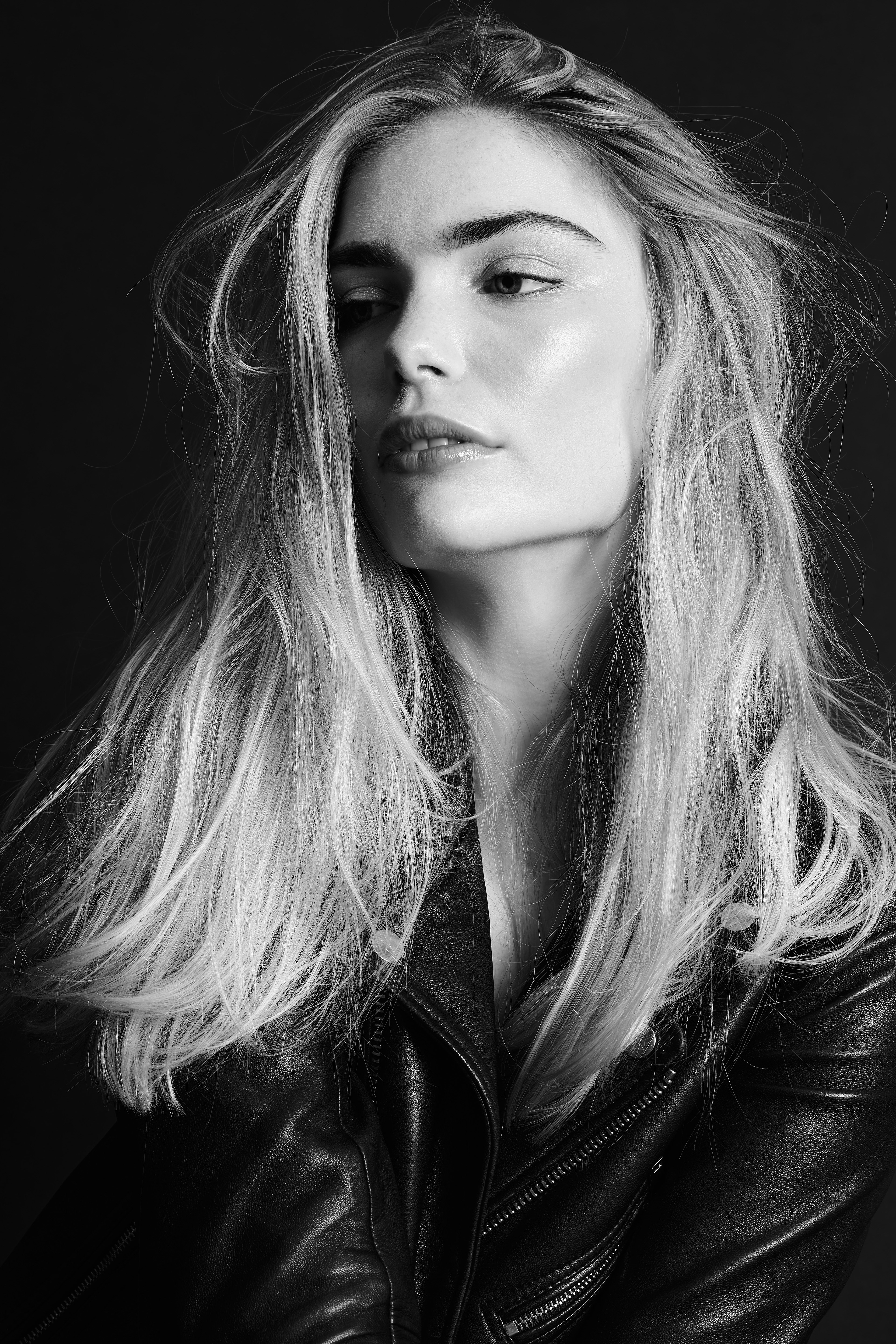 Miss Netherlands Finalist Marlies Smedinga in some black and white shots wearing a leather jacket.