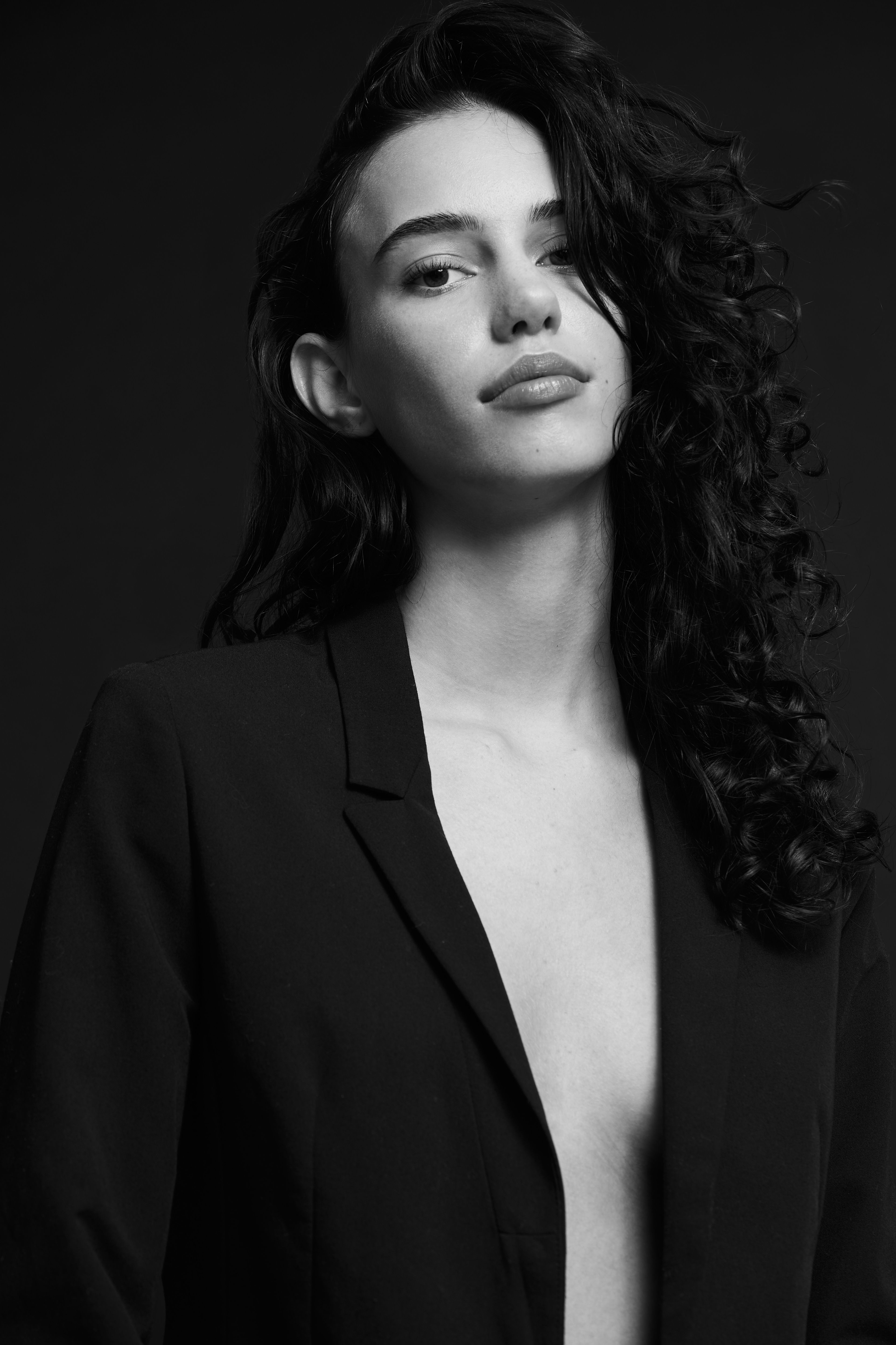 Robine Bitter from Elite Amsterdam wearing a black blazer. 