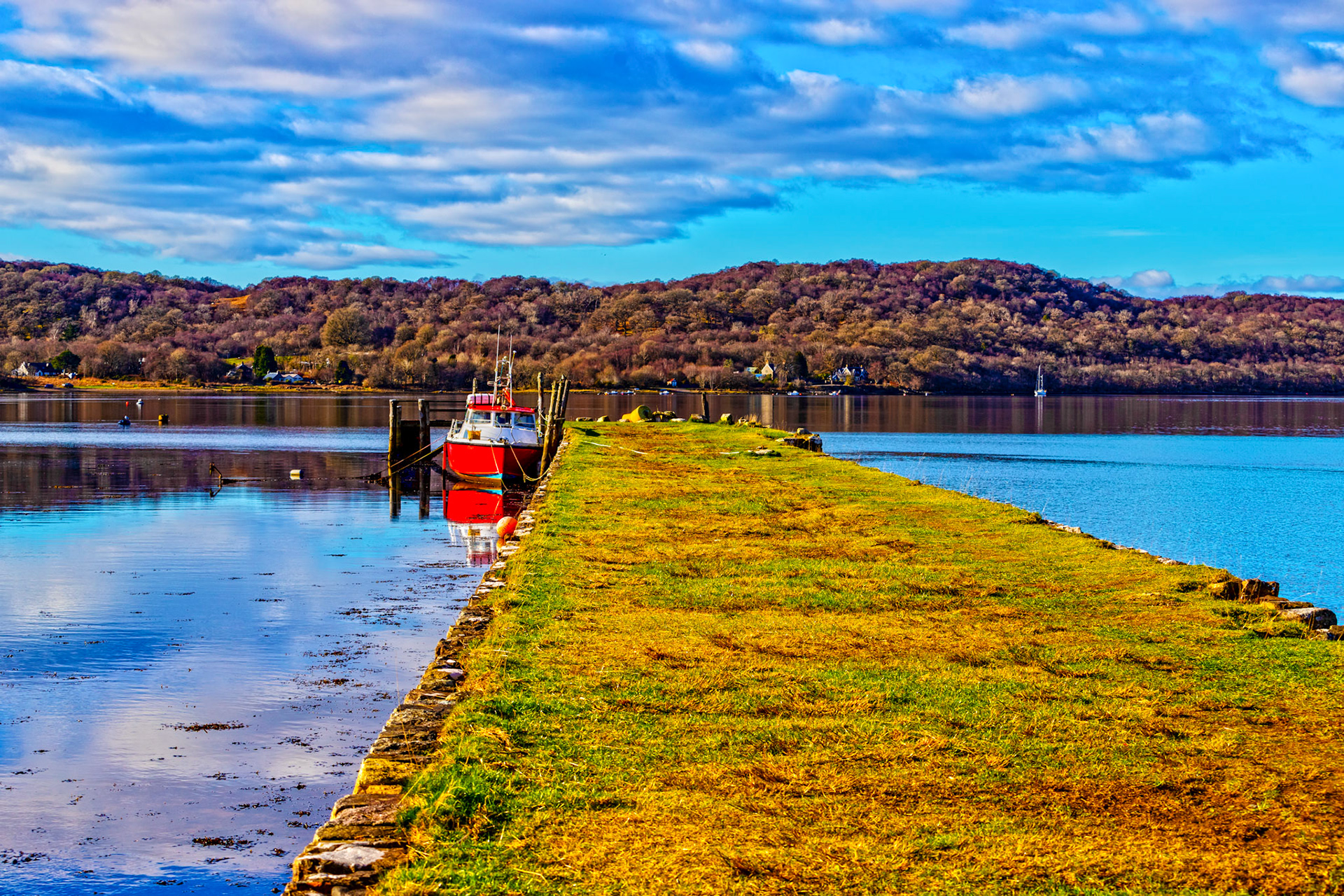 Kelly's Pier, Bonawe 25 February 2023Kelly’s Pier, of traditional drystone construction in granite, built in 1752–53, extends over 400 ft northwards into Loch Etive. It is 20 ft wide and enlarged at the head for the berthing of ships carrying iron ore from Cumbria and was built for, and possibly by, the Newland Company of Furness in Cumberland. A short extension in timber to reach deeper water was added later, probably when steamships were introduced, of which only the rotting timber piles now remain.The lease of the nearby Bonawe Furnace was assumed by Alexander Kelly of Bonawe in 1863, from whom the pier has taken its name. Repairs were made in 1960 and in 1994– 95 a full scheme of repair by traditional drystone building methods was undertaken. The pier is now privately owned and still in use.