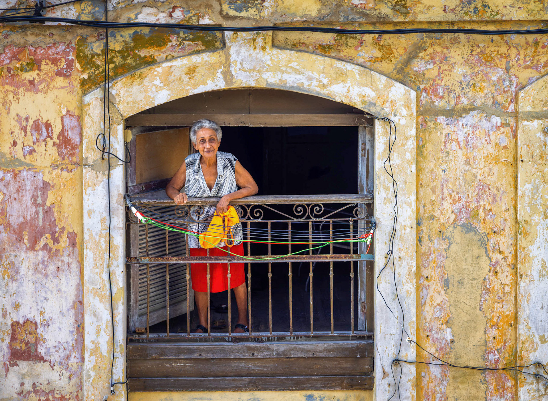 Checking on the laundry, Cuba