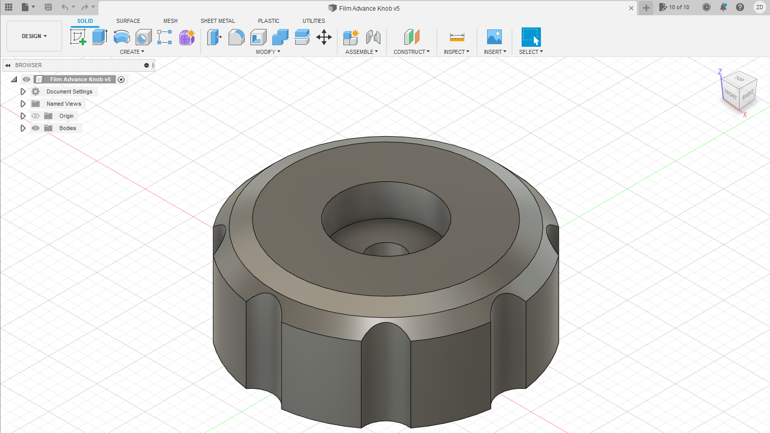 Knob used to advance film to be mounted outside of 35mm film camera body.