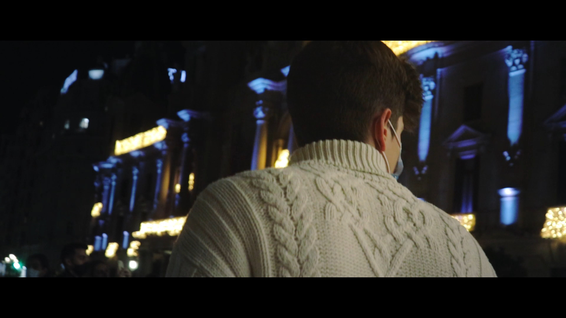 Young man walking around the city