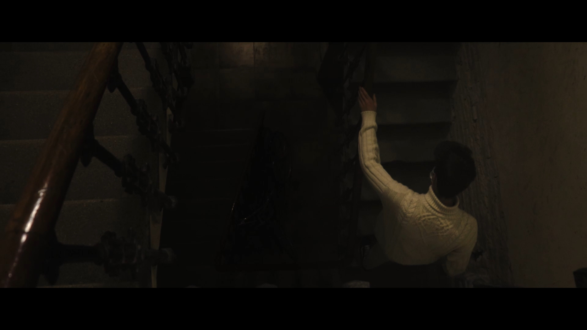 Young man walking up the stairs