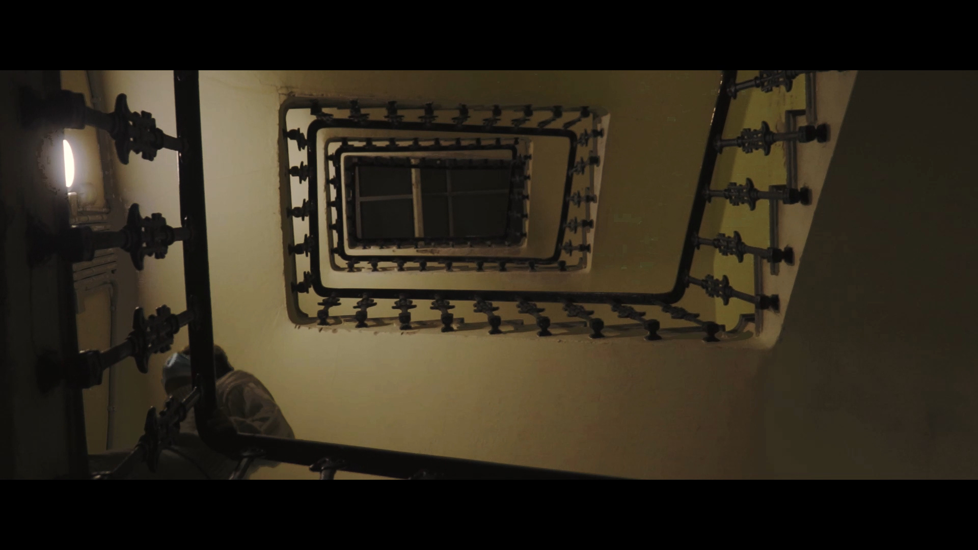 Young man walking up the stairs