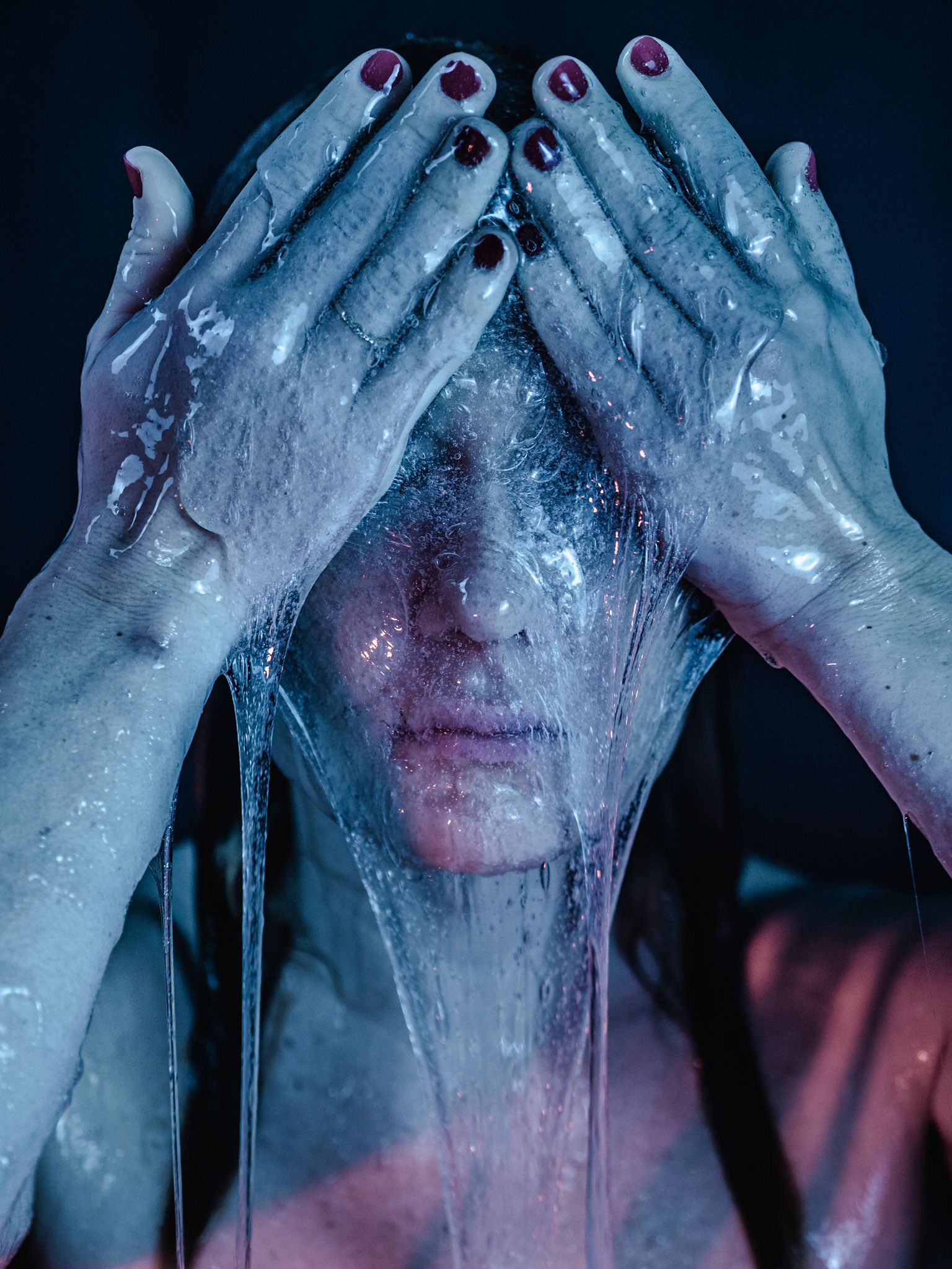 At this point, the model transitioned into the phase of acceptance. The photographer guided her by asking, "What happens if you stop resisting?" The model covered herself gently with the slime, embracing the very substance she once rejected. This act symbolized surrender—allowing emotions to exist without judgment.