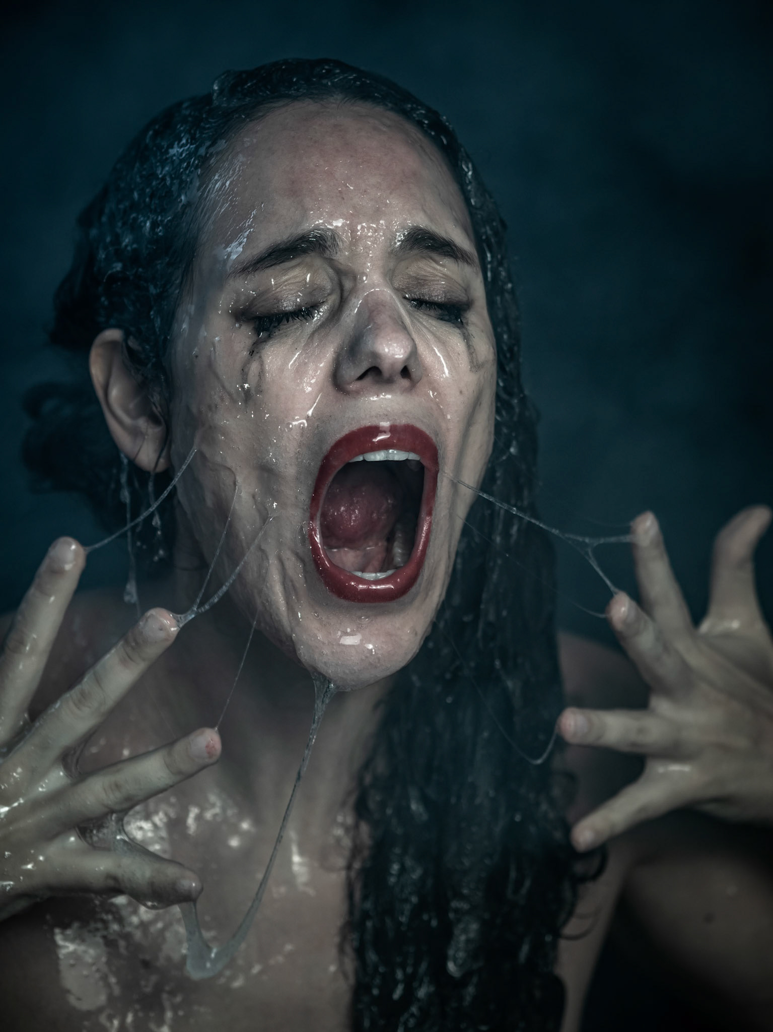 When asked, "What do you feel you cannot let go of?" the model erupted into a raw, visceral expression of frustration. Smearing the slime across her face, she embodied the crushing weight of self-deprecation. This moment encapsulated the climax of emotional burden, as though she were drowning beneath the surface of unresolved pain.