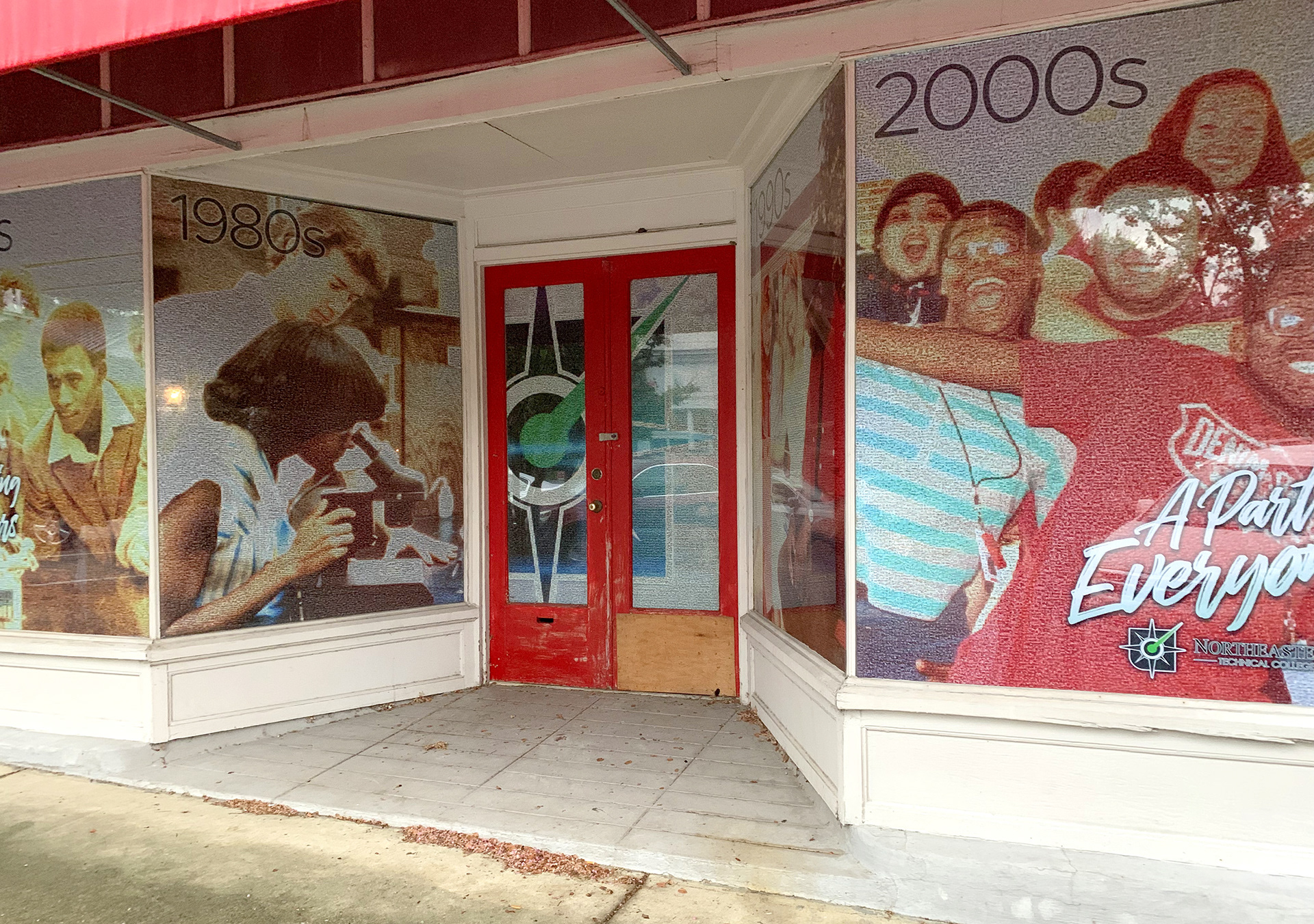 NETC 50th Anniversary - This large-scale storefront installation brought Northeastern Technical College’s history into the community through a decade-by-decade visual timeline. Each window panel is part of a massive photo mosaic built from nearly 9,000 images spanning NETC’s history, arranged across 160,000 placeholders. Prominently featured in the foreground is the phrase “A Part of Everyone,” representing NETC’s deep connection to the local community. I was given the time and creative freedom to design and carefully collect, review, and curate thousands of photos across multiple decades, allowing the final piece to authentically reflect the people and moments that shaped the college.   This project earned a 2020 NCMPR Medallion Award for Northeastern Technical College.