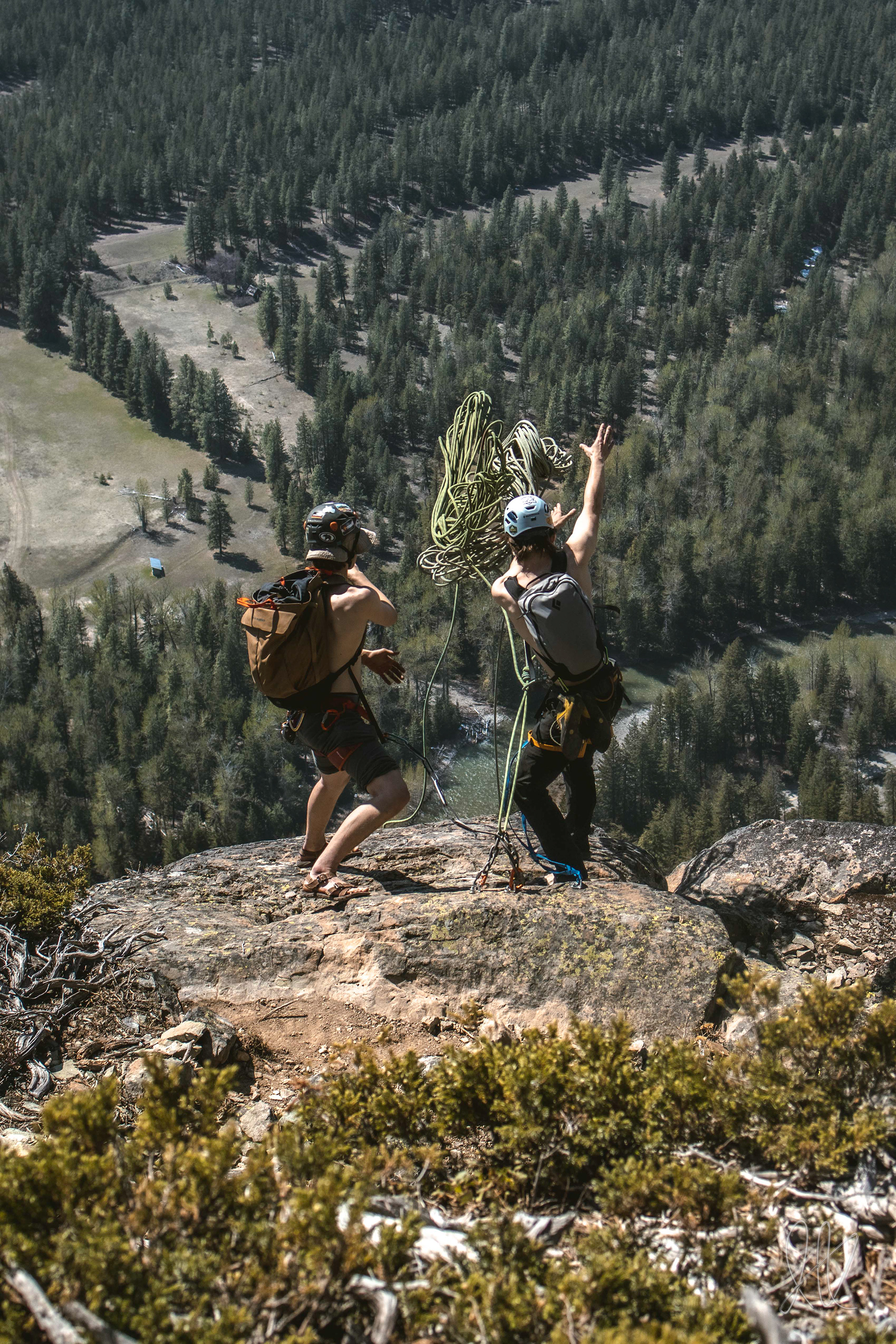 Ian Kolaja (left) and Peter Voller toss down two ropes to start a double stranded repel