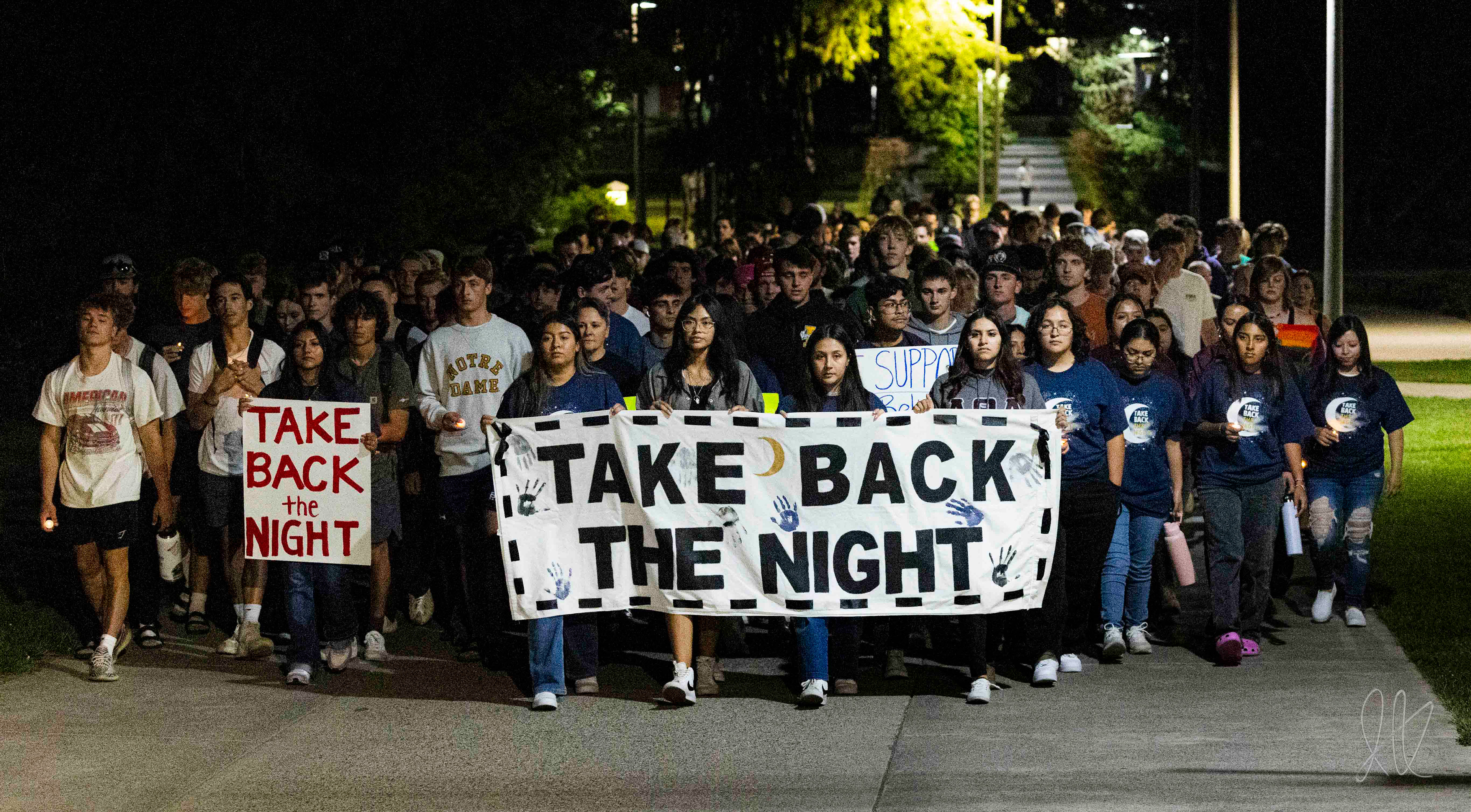 The "Take Back the Night" marchers bring their walk to a close