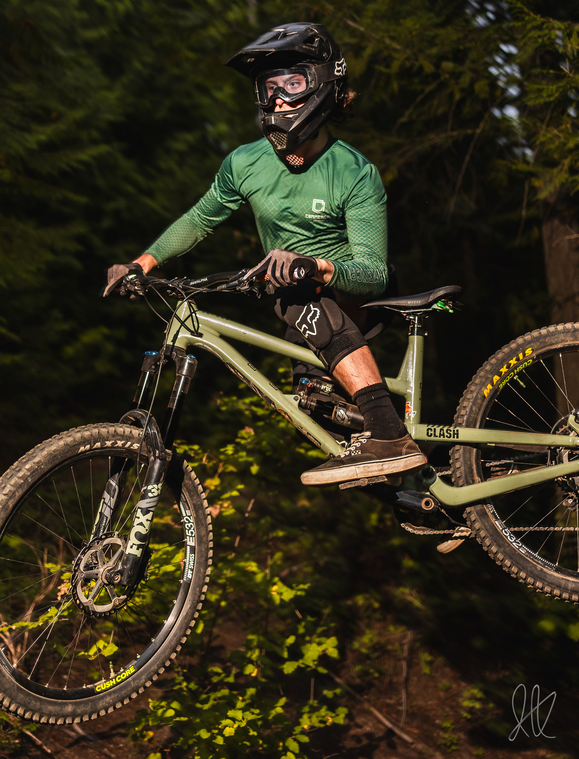 Ian Kolaja pulls for a whip off a jump on Moscow Mountain