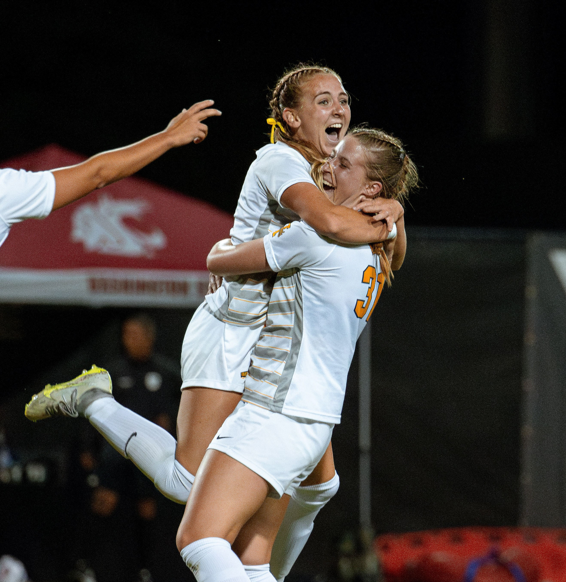 Idaho midfielder Margo Schoesler is lifted by midfielder Sara Rodgers after scoring a goal against Washington State University on Aug. 25, 2024. (Argonaut/John Keegan)