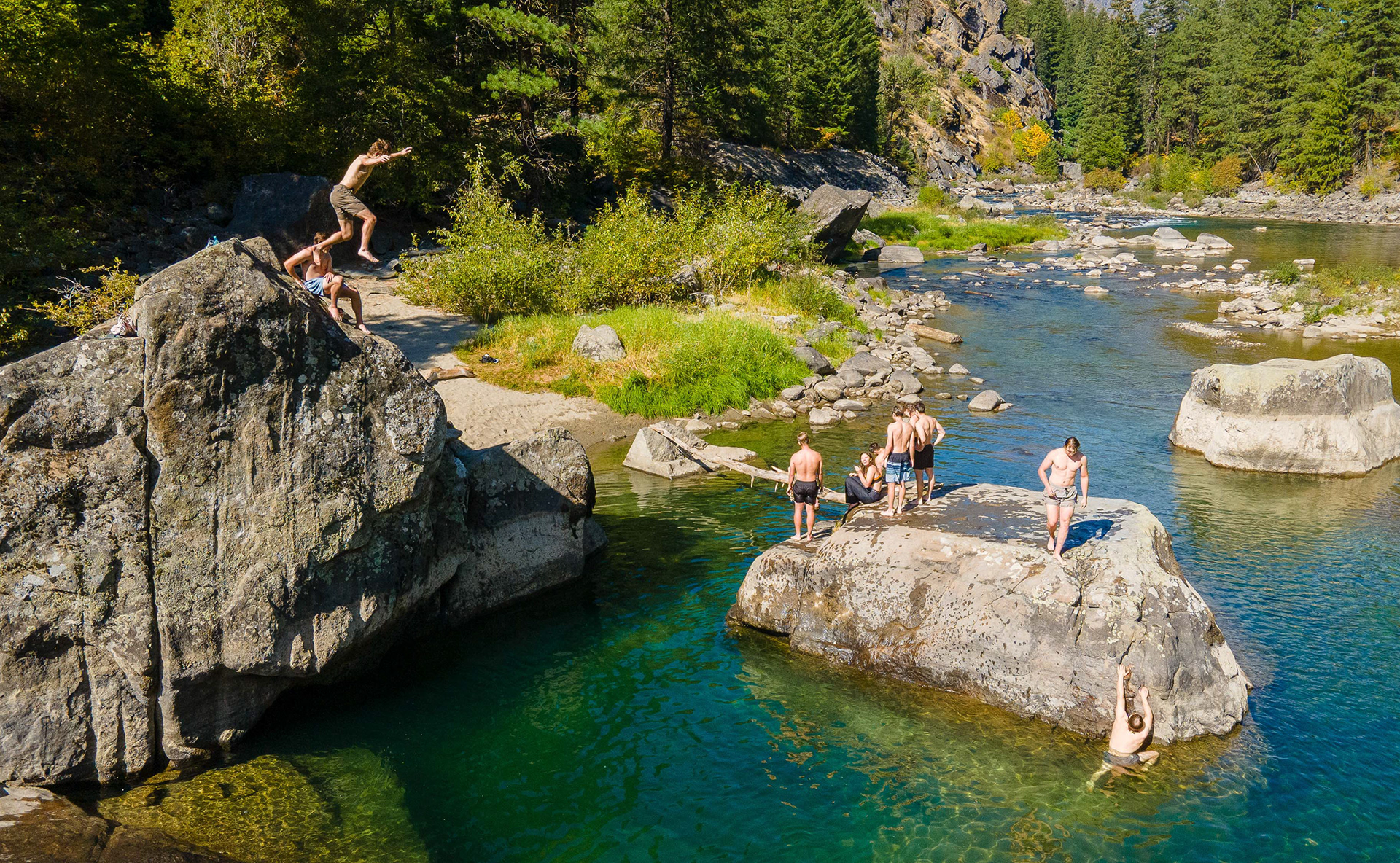 A drone photo of the University of Idaho Climbing Club swimming after bouldering for a few hours. Just west of Leavenworth, Washington, this climbing spot titled “The Beach” is a popular spot for local climbers, Sept. 28, 2024. (Photo/John Keegan)