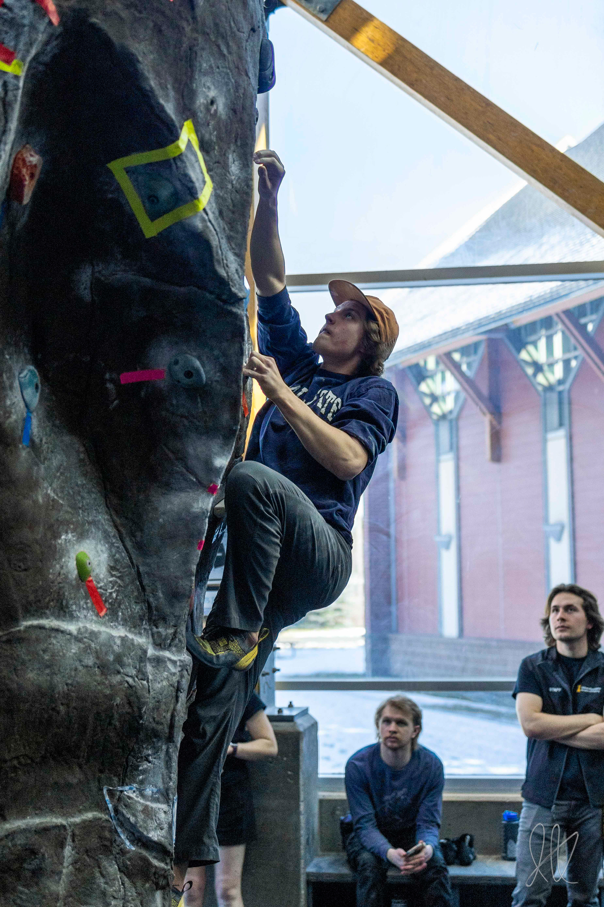 Ian Kolaja climbs a competition route at the Palouse Climbing Festival