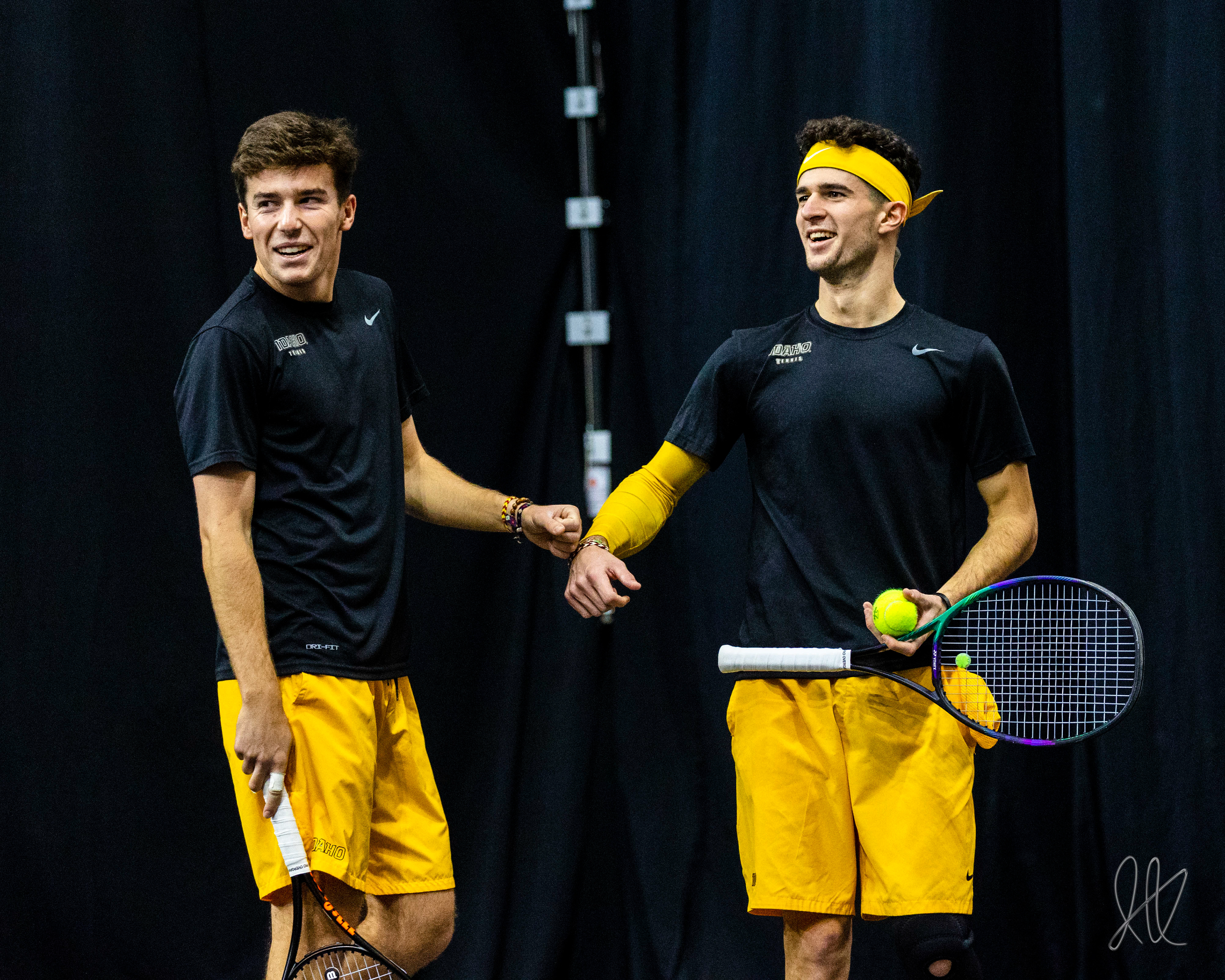 Francisco Bascon fist bumps doubles teamate Alejandro Salvador after a round