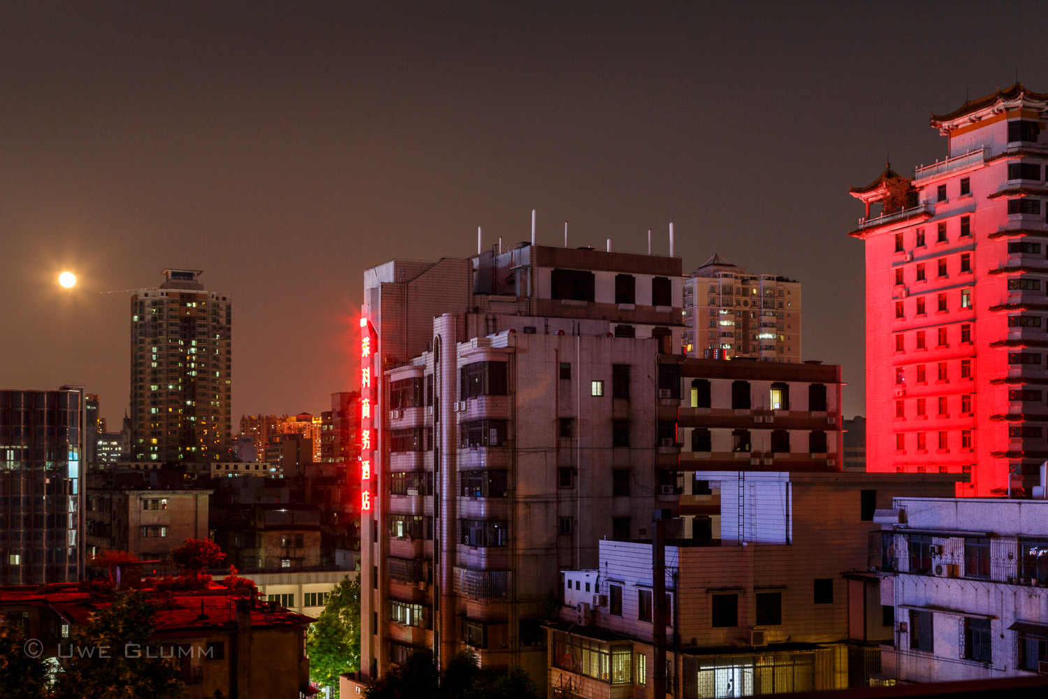 City Scape with moon. Foshan, China. September 2016