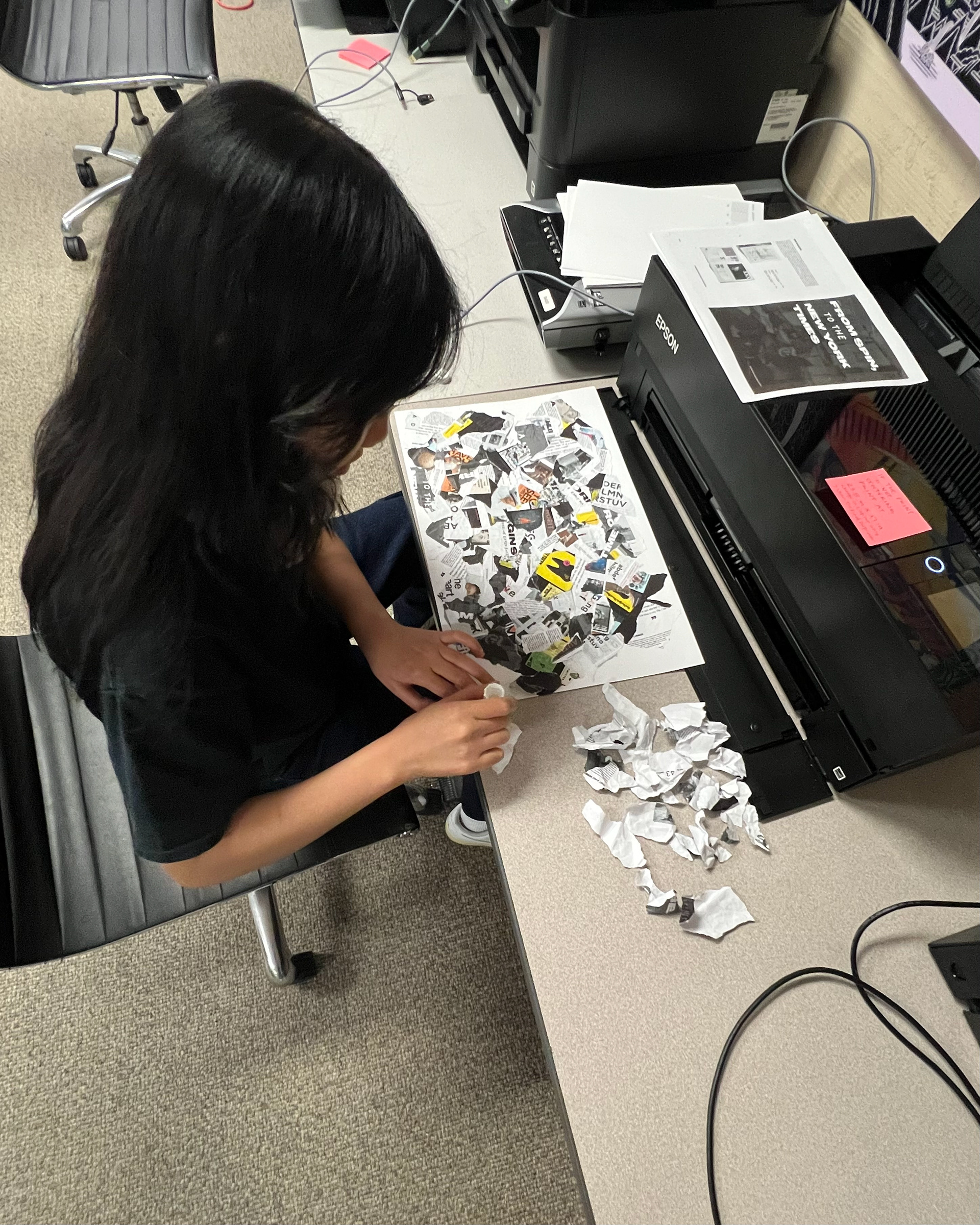 Pasting together torn pages of my monograph to make the front and back cover