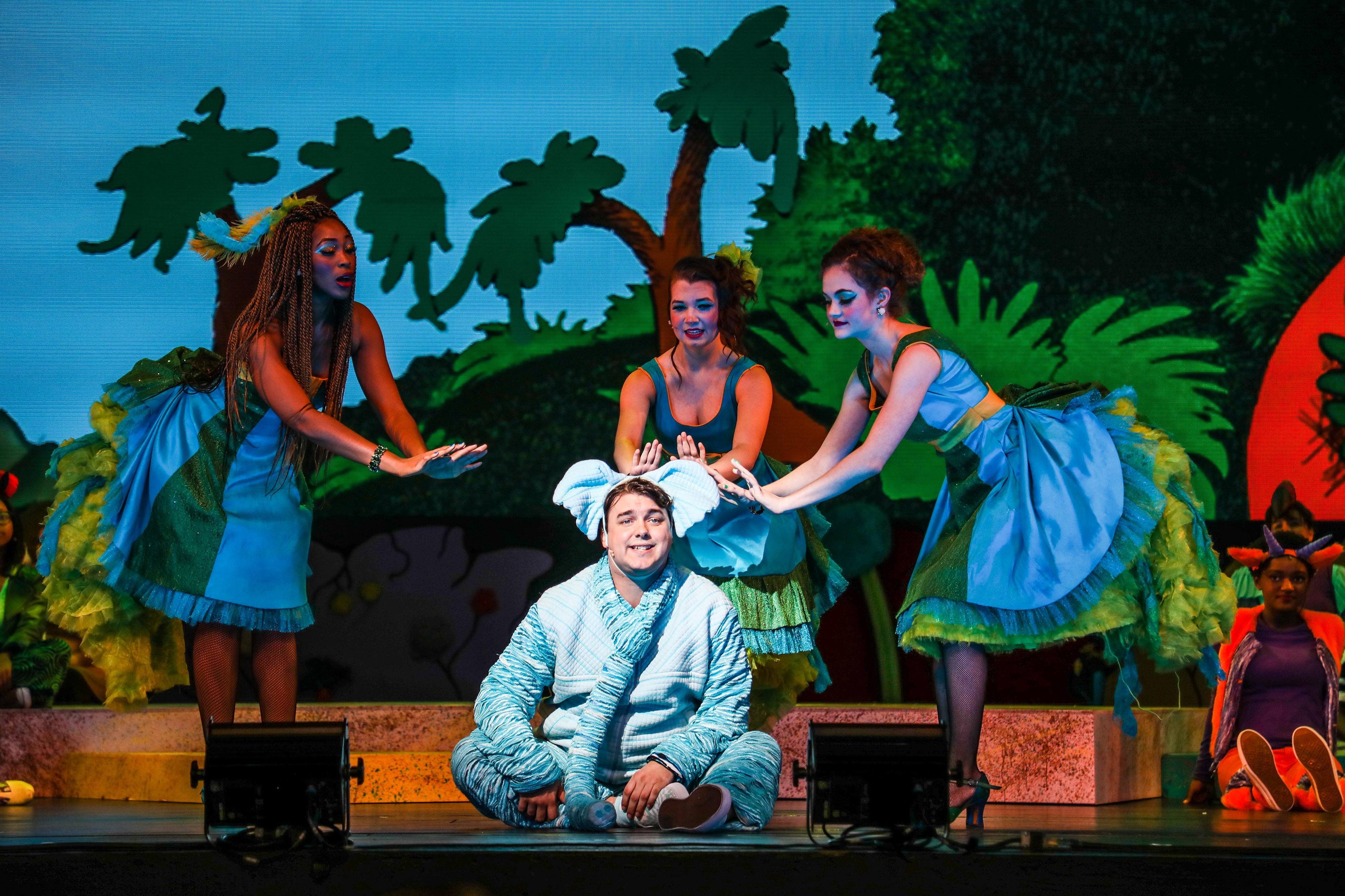 Mark Ivy as Horton the Elephant and Violet Anyaso, Morgan Munro, and Lauren Schweers as the Bird Girls. Photo Credit: Melissa Taylor