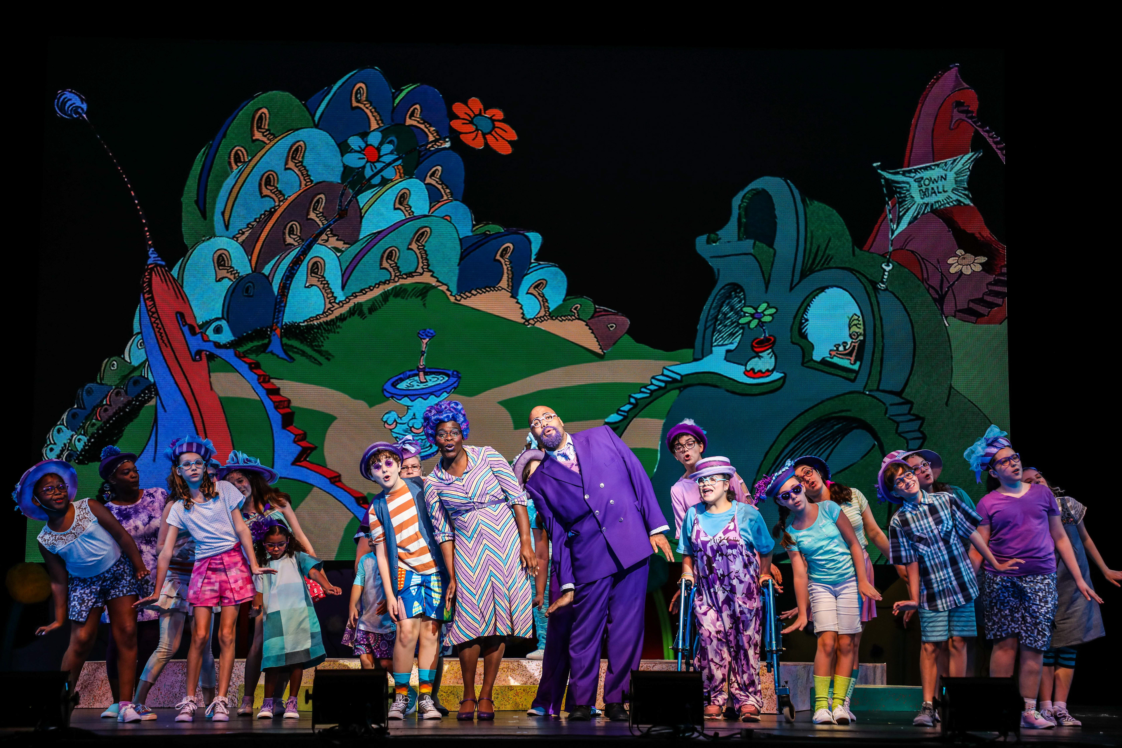 Olayemi Brown as Mrs. Mayor and LaBraska Washington as Mr. Mayor, and the cast of Seussical as the Whos. Photo Credit: Melissa Taylor