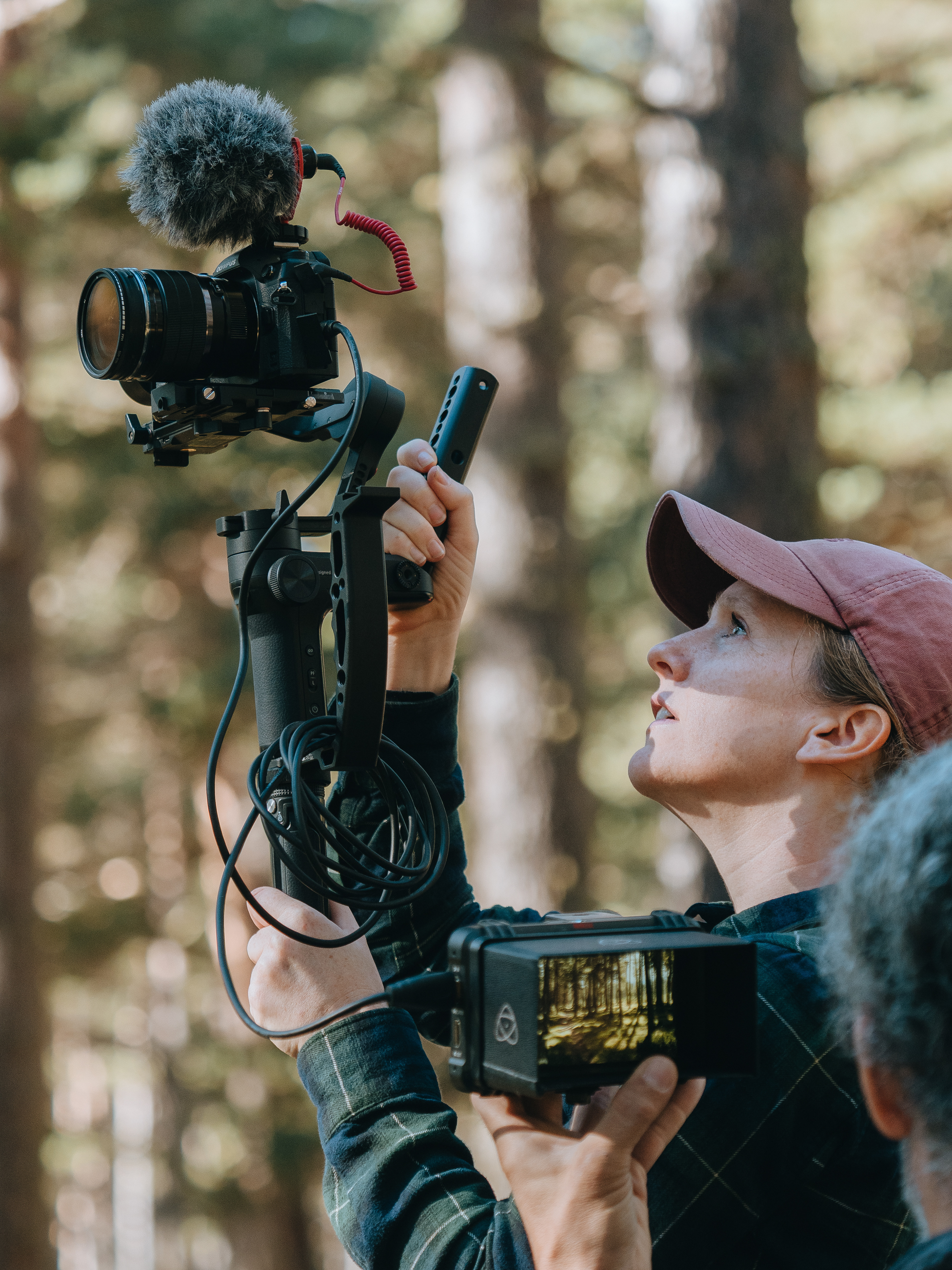 Caitlin O'Rorke filming for OM Systems with director Álvaro Sanz. Photo by Alícia Rey