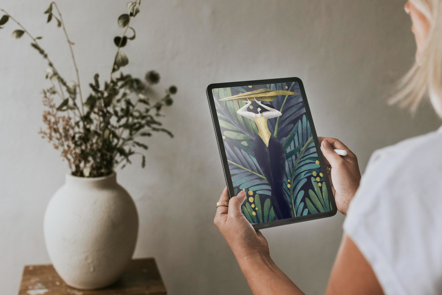 Digital tablet displaying a botanical woman illustration by Darka White Krizman, ideal for modern art lovers and unique gift ideas.