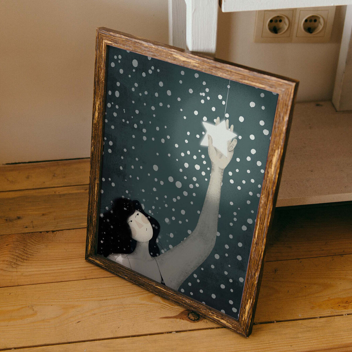 Framed illustration 'Lili Loves the Stars' by DarKa White Art, showcases a happy girl holding a bright star amidst a starry night sky, symbolizing making a wish come true. Perfect for art lovers and those seeking unique custom prints.