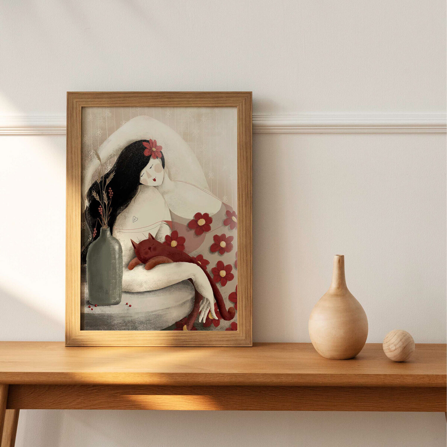 Framed custom illustration titled 'Rita is Having a Blast' by Darka Krizman, featuring a woman with black hair, a red flower, and a sleeping red cat on her lap. Ideal art print for home decor and artistic gifts.