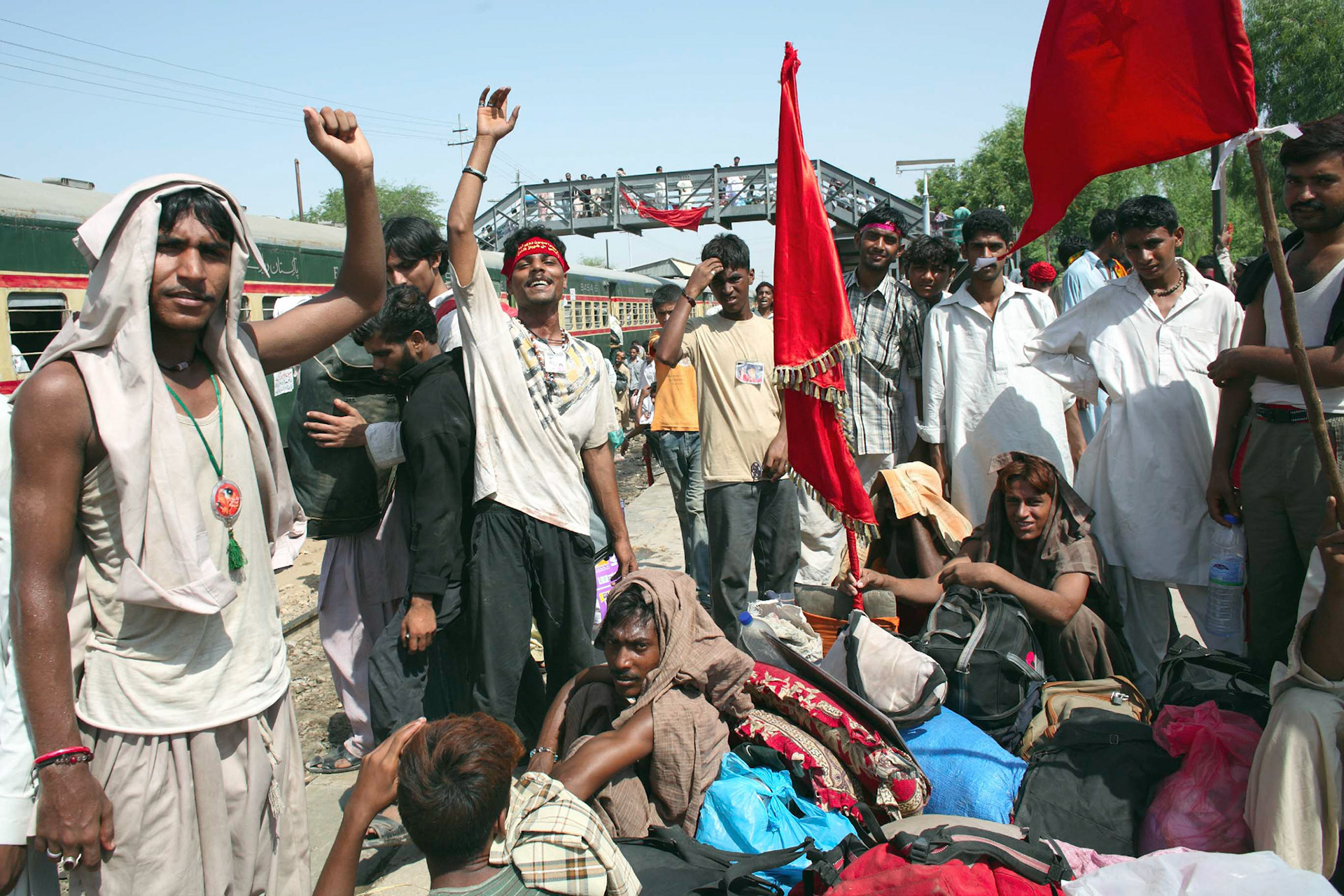 The Devotees had shouted Ya Ali to greeting when I met them at platform, Sehwan Sharif Rail way station. Ya Ali means O Muhammad. This phrase is mostly used as slogan which are meant to increase devotees morale in certain situations and also increase the religious passion. (Travel)