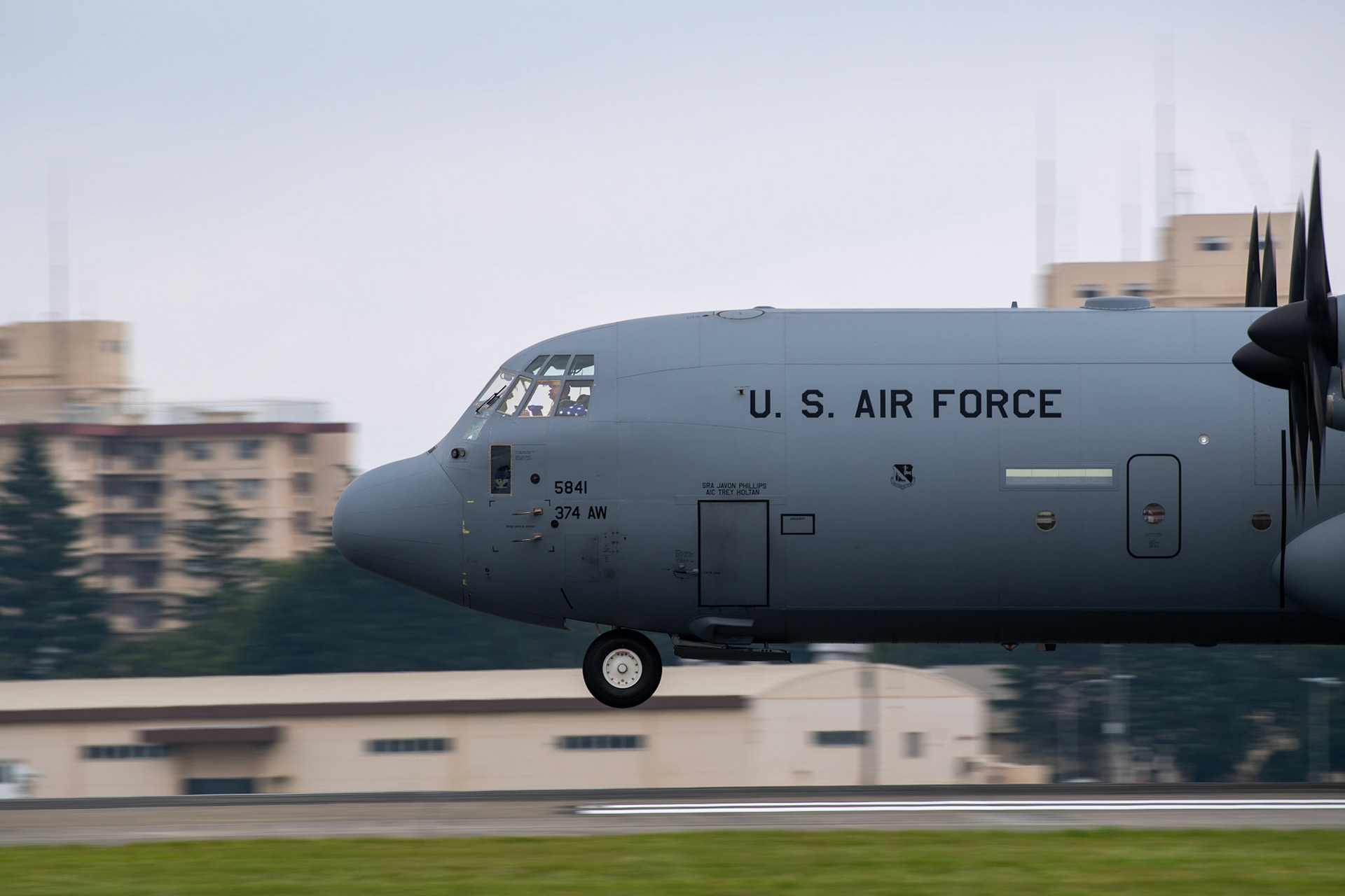 A C-130J Super Hercules assigned to the 374th Operations Group approaches Yokota Air Base, Japan during Col. Barry King’s fini-flight, July 23, 2019. The fini-flight is a time honored tradition which gives pilot and crew a chance to celebrate their flying career one last time. (U.S. Air Force photo by Yasuo Osakabe)